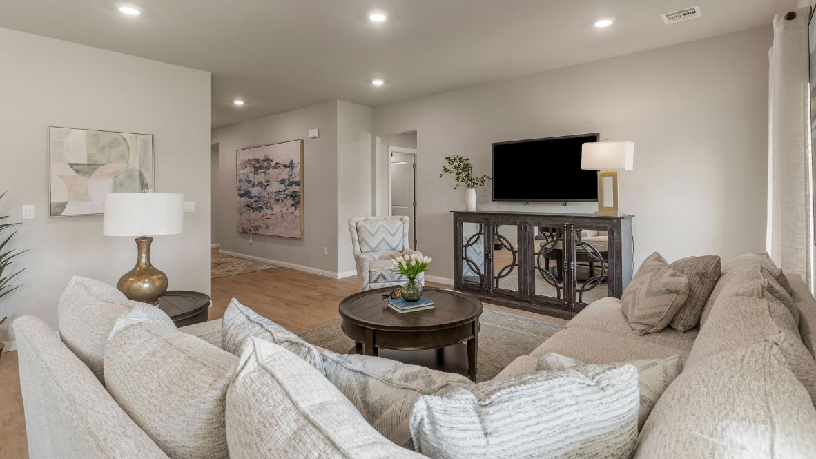 Welcome to Hawks Landing, where the Dean floor plan sets the standard for luxury and comfort in our prestigious new home community. From its grand brick and rock exterior to its professionally landscaped yard adorned with a mature tree in the front, this home boasts curb appeal that leaves a lasting impression.  Step inside to discover an inviting haven adorned with grand ceilings and an abundance of natural light that fills the space. The gourmet kitchen is a chef's dream, featuring white painted shaker style cabinets, granite countertops, and a generously-sized island perfect for hosting holiday gatherings or casual meals with loved ones. Indulge in luxury with luxury vinyl wood-look flooring throughout, offering both durability and timeless appeal. Retreat to the spa-like bathrooms, featuring a lavish walk-in shower with a full glass enclosure and 12x24 timeless marble tile surrounds in all showers.  Enjoy outdoor living to the fullest with a covered patio perfect for relaxing and entertaining. Plus, experience the convenience of smart home features and the sustainability of energy-efficient systems, ensuring your home is both technologically advanced and environmentally friendly.  Don't miss the opportunity to make the Dean floor plan your own. Contact us today and embark on the journey to your dream home in Hawks Landing.