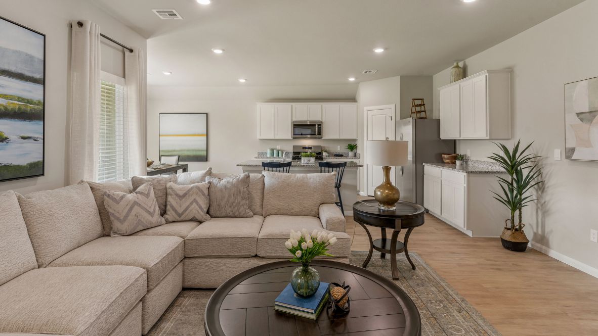 Welcome to Hawks Landing, where the Dean floor plan sets the standard for luxury and comfort in our prestigious new home community. From its grand brick and rock exterior to its professionally landscaped yard adorned with a mature tree in the front, this home boasts curb appeal that leaves a lasting impression.  Step inside to discover an inviting haven adorned with grand ceilings and an abundance of natural light that fills the space. The gourmet kitchen is a chef's dream, featuring white painted shaker style cabinets, granite countertops, and a generously-sized island perfect for hosting holiday gatherings or casual meals with loved ones. Indulge in luxury with luxury vinyl wood-look flooring throughout, offering both durability and timeless appeal. Retreat to the spa-like bathrooms, featuring a lavish walk-in shower with a full glass enclosure and 12x24 timeless marble tile surrounds in all showers.  Enjoy outdoor living to the fullest with a covered patio perfect for relaxing and entertaining. Plus, experience the convenience of smart home features and the sustainability of energy-efficient systems, ensuring your home is both technologically advanced and environmentally friendly.  Don't miss the opportunity to make the Dean floor plan your own. Contact us today and embark on the journey to your dream home in Hawks Landing.