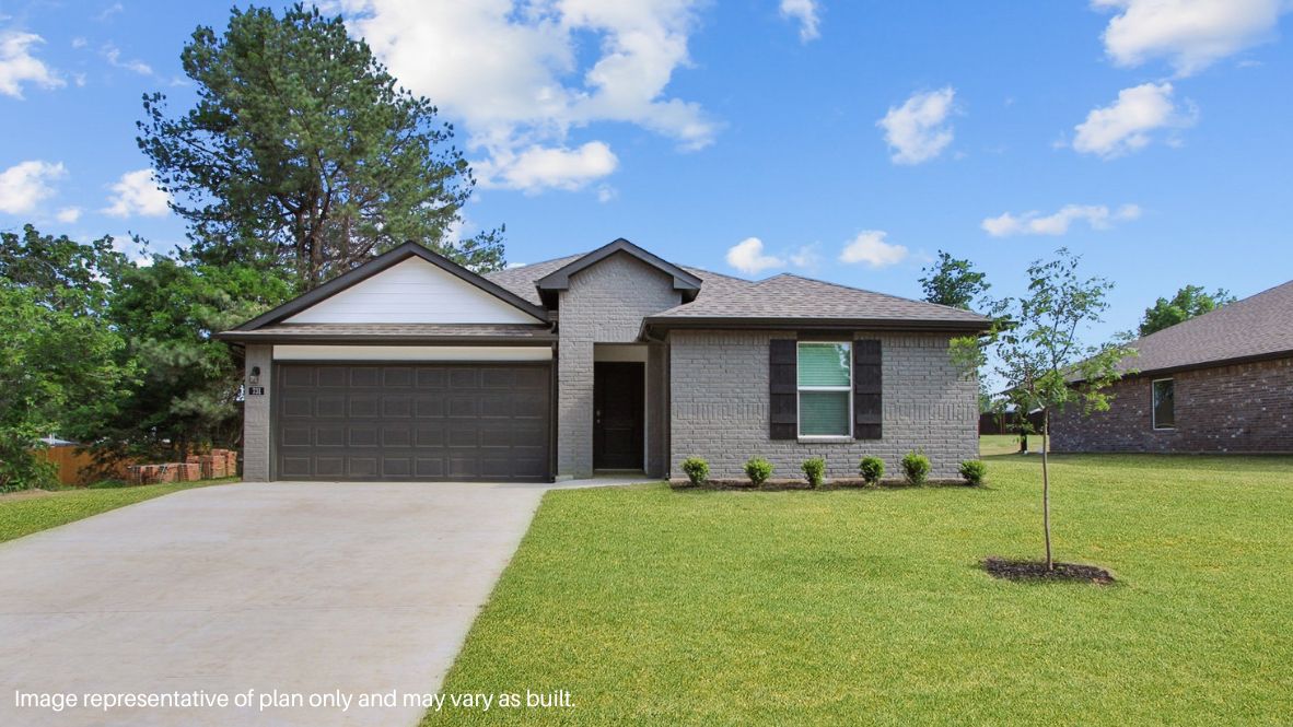 Sidewalk view showing front elevation, lawn, and architectural style