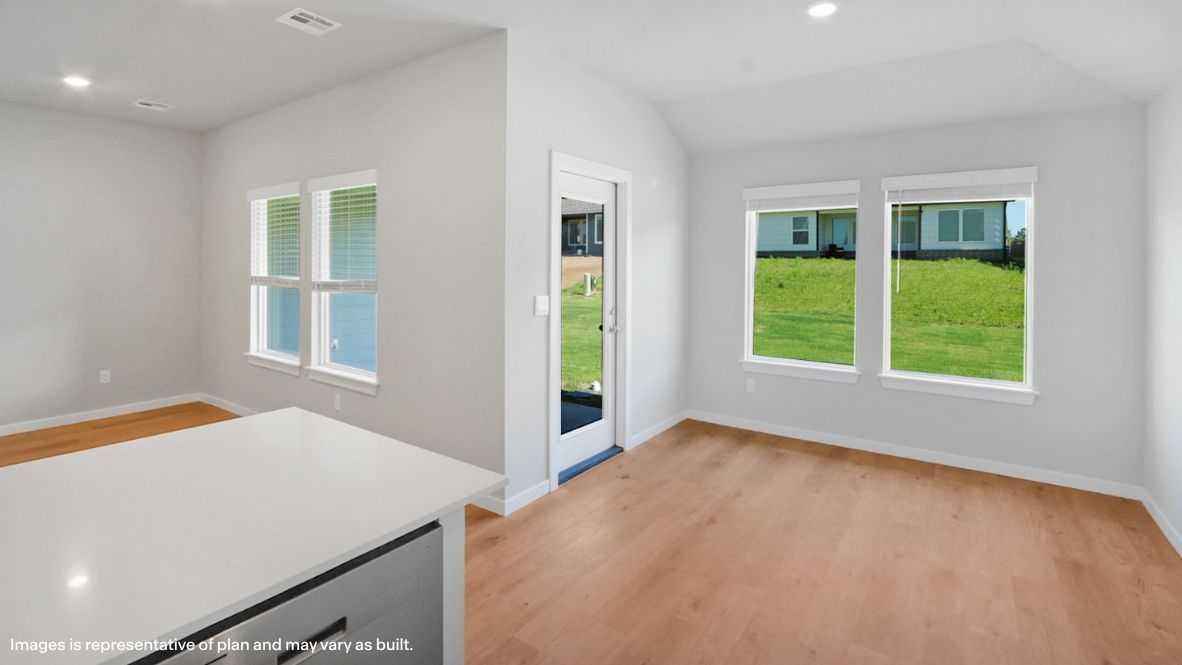 Kitchen view to outside, dining and living areas Fargo plan, Cedars at the Preserve