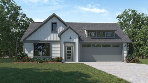 Exterior of one story home with white cladding and a two car garage
