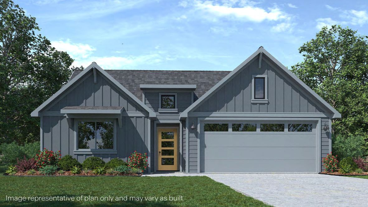 Newly built single story brick home with modern architecture, a double garage, and landscaped front yard.