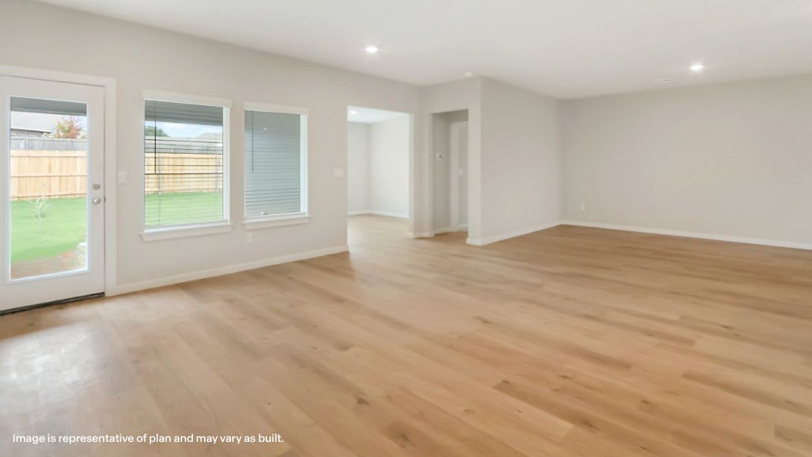 Kitchen view into dining, living, and outside areas with fresh open design Rowan Grove