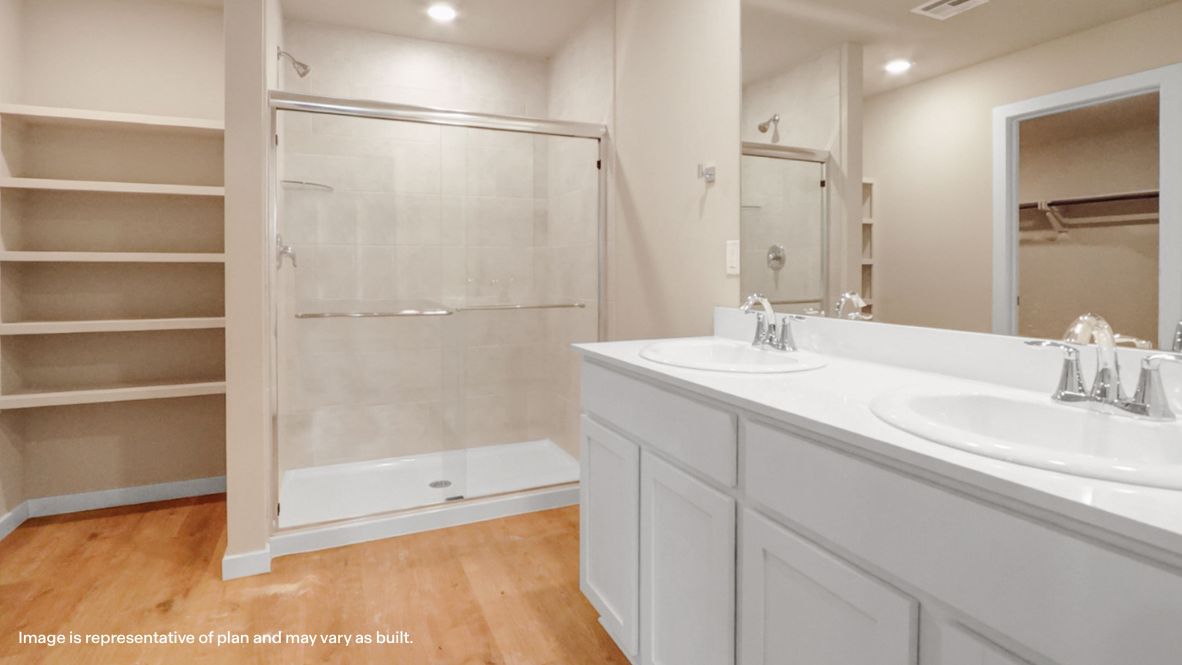 Owner's ensuite includes walk-in shower, vanity, and nearby walk-in closet access