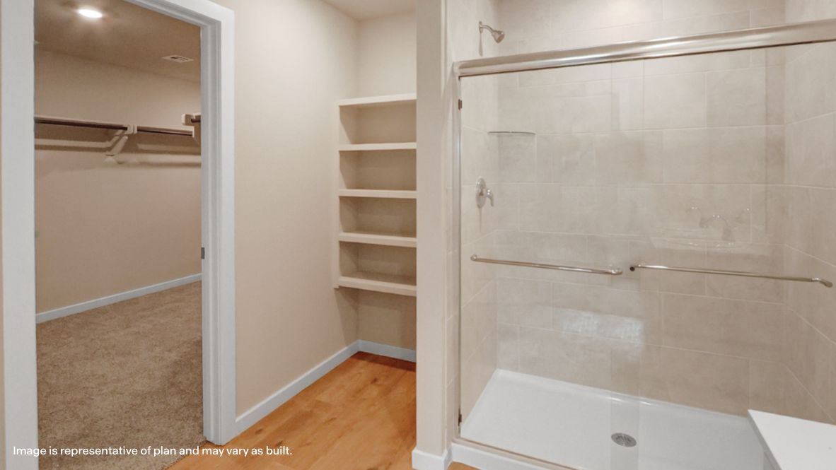 Primary bedroom designed with privacy and comfort flowing into spa-inspired ensuite and walk-in closet Rowan Grove
