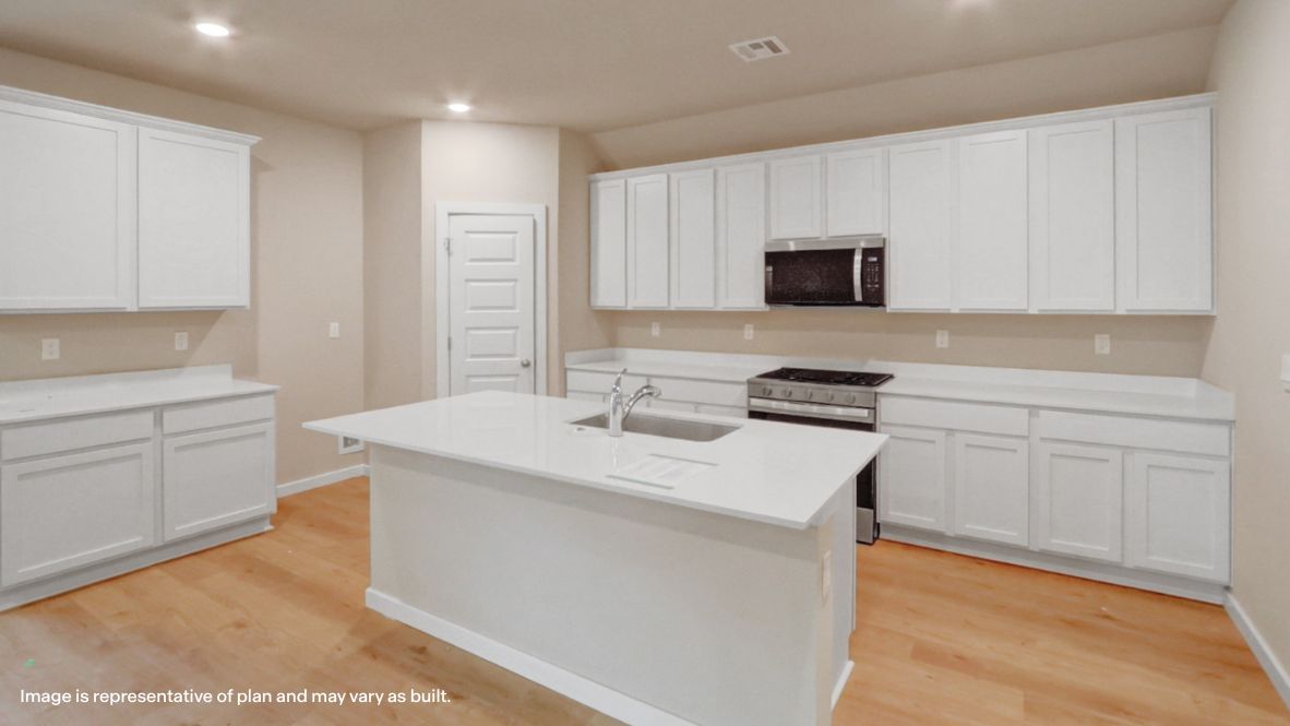 Kitchen island design with sink, prep zones, and new appliance suite included
