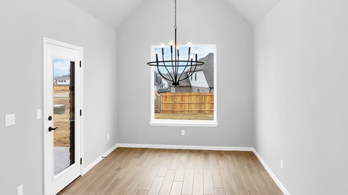 Discover the stunning Monterrey floorplan at Creekside at Forest Ridge in Broken Arrow. This spacious 2,489 sq ft, 1-story home features 3 bedrooms, 2.5 bathrooms, and a 3-car garage, offering the perfect blend of luxury and comfort. The inviting living room boasts vaulted ceilings and a cozy gas fireplace, while an abundance of windows lets in natural light and provides a beautiful view of the backyard. The large kitchen is a chef’s dream, with elegant quartz countertops, ample storage space, and modern light fixtures that add a touch of sophistication. The master bedroom is a true retreat, featuring plush carpeting, vaulted ceilings, and an en-suite bathroom with dual vanities and a large jacuzzi tub – perfect for relaxation. Whether you're entertaining guests or enjoying quiet family time, the Monterrey floorplan offers both style and functionality. Located in the highly sought-after Creekside at Forest Ridge community, this home provides the ideal living space in Broken Arrow.