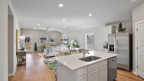 Interior of kitchen looking over the island into the living room