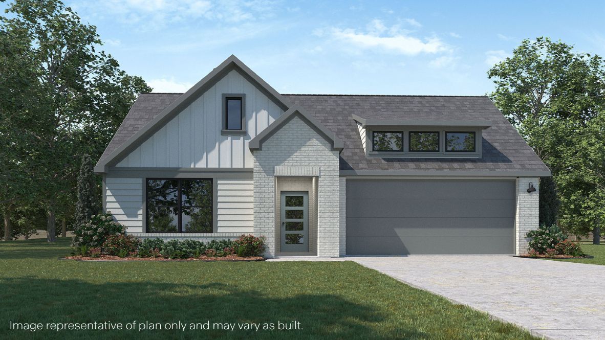 Newly built single story brick home with modern architecture, a double garage, and landscaped front yard.