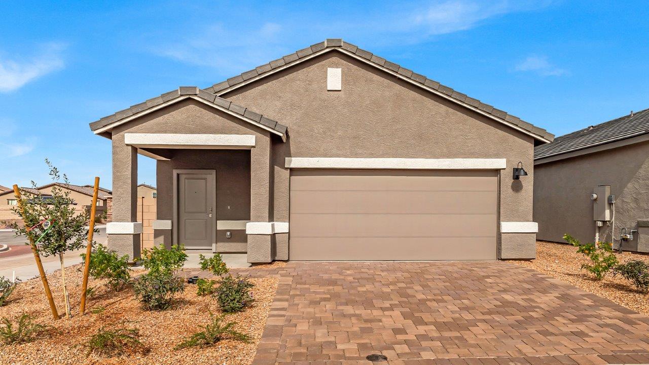 Discover new homes within the only gated community in Gladden Farms. Coronet at Gladden Farms, a premier D.R. Horton community where modern living meets the scenic charm of Marana, Arizona. Coronet offers residents the perfect blend of small-town warmth and modern amenities. Surrounded by 830 acres of green space, 28 parks, and 19 playgrounds, this gated community is designed for families who value both comfort and outdoor adventure.  Residents of Coronet at Gladden Farms enjoy exclusive amenities such as a sparkling community pool, jacuzzi, fitness center, and a clubhouse complete with a BBQ area and patio. The community also offers walking trails, a dog park, and playgrounds, making it the ideal environment for families and active lifestyles. Each home is thoughtfully designed with high-end finishes, including quartz countertops, wood-look luxury vinyl plank flooring, tile roofs, Spanish Lace stucco exteriors and beautifully landscaped front yards with auto drip irrigation. Additionally, all homes feature covered front porches and back patios, perfect for enjoying the stunning Arizona sunsets and monsoons.  Coronet at Gladden Farms is built with a commitment to energy efficiency and sustainability. Each home meets the DOE Zero Energy Ready Home standards, meaning they are constructed to be so energy-efficient that a renewable energy system could offset most or all of the home's annual energy use. These homes include advanced features such as tankless water heaters, energy-efficient LED lighting, and high-performance insulation, ensuring lower utility costs and a reduced environmental footprint. The Home is Connected Smart Home package, which includes a smart thermostat, video doorbell, keyless entry, a Wi-Fi-enabled garage door opener, and much more, provides modern convenience and enhanced security.  Living in Coronet at Gladden Farms means being part of a thriving community with easy access to shopping, dining, and recreation. The greater Gladden Farms area is equipped with amenities like a splashpad, soccer fields, and the Paws & Claws Dog Park. Families will appreciate being part of the Marana Unified School District, with Gladden Farms Elementary nearby and a new K-8 school opening in 2025.  Beyond the community, residents can explore the natural beauty of the area with proximity to Picacho Peak State Park, Tortolita Mountain Park, and Saguaro National Park, offering endless opportunities for hiking, cycling, and wildlife viewing. Experience the perfect blend of comfort, convenience, and community at Coronet at Gladden Farms—where new homes, energy efficiency, and a vibrant lifestyle await.