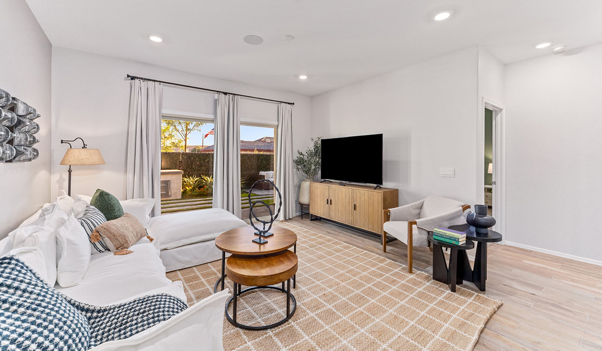 Discover new homes within the only gated community in Gladden Farms. Coronet at Gladden Farms, a premier D.R. Horton community where modern living meets the scenic charm of Marana, Arizona. Coronet offers residents the perfect blend of small-town warmth and modern amenities. Surrounded by 830 acres of green space, 28 parks, and 19 playgrounds, this gated community is designed for families who value both comfort and outdoor adventure.  Residents of Coronet at Gladden Farms enjoy exclusive amenities such as a sparkling community pool, jacuzzi, fitness center, and a clubhouse complete with a BBQ area and patio. The community also offers walking trails, a dog park, and playgrounds, making it the ideal environment for families and active lifestyles. Each home is thoughtfully designed with high-end finishes, including quartz countertops, wood-look luxury vinyl plank flooring, tile roofs, Spanish Lace stucco exteriors and beautifully landscaped front yards with auto drip irrigation. Additionally, all homes feature covered front porches and back patios, perfect for enjoying the stunning Arizona sunsets and monsoons.  Coronet at Gladden Farms is built with a commitment to energy efficiency and sustainability. Each home meets the DOE Zero Energy Ready Home standards, meaning they are constructed to be so energy-efficient that a renewable energy system could offset most or all of the home's annual energy use. These homes include advanced features such as tankless water heaters, energy-efficient LED lighting, and high-performance insulation, ensuring lower utility costs and a reduced environmental footprint. The Home is Connected Smart Home package, which includes a smart thermostat, video doorbell, keyless entry, a Wi-Fi-enabled garage door opener, and much more, provides modern convenience and enhanced security.  Living in Coronet at Gladden Farms means being part of a thriving community with easy access to shopping, dining, and recreation. The greater Gladden Farms area is equipped with amenities like a splashpad, soccer fields, and the Paws & Claws Dog Park. Families will appreciate being part of the Marana Unified School District, with Gladden Farms Elementary nearby and a new K-8 school opening in 2025.  Beyond the community, residents can explore the natural beauty of the area with proximity to Picacho Peak State Park, Tortolita Mountain Park, and Saguaro National Park, offering endless opportunities for hiking, cycling, and wildlife viewing. Experience the perfect blend of comfort, convenience, and community at Coronet at Gladden Farms—where new homes, energy efficiency, and a vibrant lifestyle await.