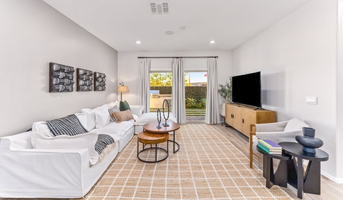 Discover new homes within the only gated community in Gladden Farms. Coronet at Gladden Farms, a premier D.R. Horton community where modern living meets the scenic charm of Marana, Arizona. Coronet offers residents the perfect blend of small-town warmth and modern amenities. Surrounded by 830 acres of green space, 28 parks, and 19 playgrounds, this gated community is designed for families who value both comfort and outdoor adventure. Residents of Coronet at Gladden Farms enjoy exclusive amenities such as a sparkling community pool, jacuzzi, fitness center, and a clubhouse complete with a BBQ area and patio. The community also offers walking trails, a dog park, and playgrounds, making it the ideal environment for families and active lifestyles. Each home is thoughtfully designed with high-end finishes, including quartz countertops, wood-look luxury vinyl plank flooring, tile roofs, Spanish Lace stucco exteriors and beautifully landscaped front yards with auto drip irrigation. Additionally, all homes feature covered front porches and back patios, perfect for enjoying the stunning Arizona sunsets and monsoons. Coronet at Gladden Farms is built with a commitment to energy efficiency and sustainability. Each home meets the DOE Zero Energy Ready Home standards, meaning they are constructed to be so energy-efficient that a renewable energy system could offset most or all of the home's annual energy use. These homes include advanced features such as tankless water heaters, energy-efficient LED lighting, and high-performance insulation, ensuring lower utility costs and a reduced environmental footprint. The Home is Connected Smart Home package, which includes a smart thermostat, video doorbell, keyless entry, a Wi-Fi-enabled garage door opener, and much more, provides modern convenience and enhanced security. Living in Coronet at Gladden Farms means being part of a thriving community with easy access to shopping, dining, and recreation. The greater Gladden Farms area is equipped with amenities like a splashpad, soccer fields, and the Paws & Claws Dog Park. Families will appreciate being part of the Marana Unified School District, with Gladden Farms Elementary nearby and a new K-8 school opening in 2025. Beyond the community, residents can explore the natural beauty of the area with proximity to Picacho Peak State Park, Tortolita Mountain Park, and Saguaro National Park, offering endless opportunities for hiking, cycling, and wildlife viewing. Experience the perfect blend of comfort, convenience, and community at Coronet at Gladden Farms—where new homes, energy efficiency, and a vibrant lifestyle await.