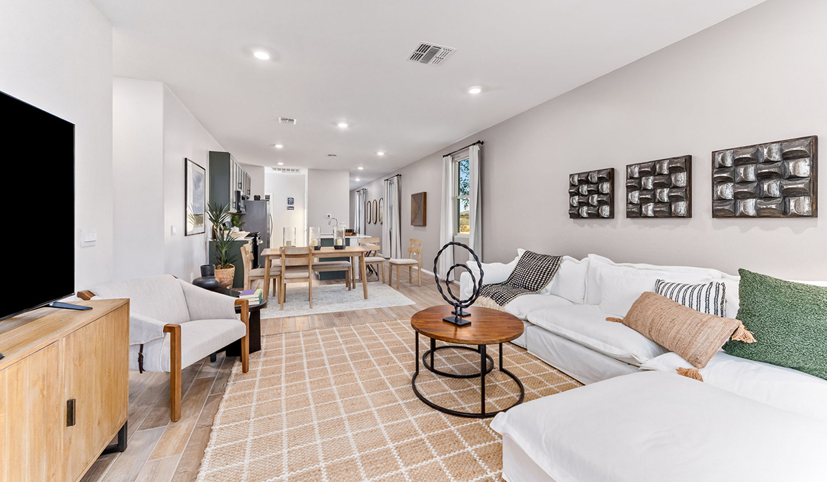 Discover new homes within the only gated community in Gladden Farms. Coronet at Gladden Farms, a premier D.R. Horton community where modern living meets the scenic charm of Marana, Arizona. Coronet offers residents the perfect blend of small-town warmth and modern amenities. Surrounded by 830 acres of green space, 28 parks, and 19 playgrounds, this gated community is designed for families who value both comfort and outdoor adventure.  Residents of Coronet at Gladden Farms enjoy exclusive amenities such as a sparkling community pool, jacuzzi, fitness center, and a clubhouse complete with a BBQ area and patio. The community also offers walking trails, a dog park, and playgrounds, making it the ideal environment for families and active lifestyles. Each home is thoughtfully designed with high-end finishes, including quartz countertops, wood-look luxury vinyl plank flooring, tile roofs, Spanish Lace stucco exteriors and beautifully landscaped front yards with auto drip irrigation. Additionally, all homes feature covered front porches and back patios, perfect for enjoying the stunning Arizona sunsets and monsoons.  Coronet at Gladden Farms is built with a commitment to energy efficiency and sustainability. Each home meets the DOE Zero Energy Ready Home standards, meaning they are constructed to be so energy-efficient that a renewable energy system could offset most or all of the home's annual energy use. These homes include advanced features such as tankless water heaters, energy-efficient LED lighting, and high-performance insulation, ensuring lower utility costs and a reduced environmental footprint. The Home is Connected Smart Home package, which includes a smart thermostat, video doorbell, keyless entry, a Wi-Fi-enabled garage door opener, and much more, provides modern convenience and enhanced security.  Living in Coronet at Gladden Farms means being part of a thriving community with easy access to shopping, dining, and recreation. The greater Gladden Farms area is equipped with amenities like a splashpad, soccer fields, and the Paws & Claws Dog Park. Families will appreciate being part of the Marana Unified School District, with Gladden Farms Elementary nearby and a new K-8 school opening in 2025.  Beyond the community, residents can explore the natural beauty of the area with proximity to Picacho Peak State Park, Tortolita Mountain Park, and Saguaro National Park, offering endless opportunities for hiking, cycling, and wildlife viewing. Experience the perfect blend of comfort, convenience, and community at Coronet at Gladden Farms—where new homes, energy efficiency, and a vibrant lifestyle await.