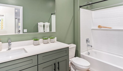 Discover new homes within the only gated community in Gladden Farms. Coronet at Gladden Farms, a premier D.R. Horton community where modern living meets the scenic charm of Marana, Arizona. Coronet offers residents the perfect blend of small-town warmth and modern amenities. Surrounded by 830 acres of green space, 28 parks, and 19 playgrounds, this gated community is designed for families who value both comfort and outdoor adventure. Residents of Coronet at Gladden Farms enjoy exclusive amenities such as a sparkling community pool, jacuzzi, fitness center, and a clubhouse complete with a BBQ area and patio. The community also offers walking trails, a dog park, and playgrounds, making it the ideal environment for families and active lifestyles. Each home is thoughtfully designed with high-end finishes, including quartz countertops, wood-look luxury vinyl plank flooring, tile roofs, Spanish Lace stucco exteriors and beautifully landscaped front yards with auto drip irrigation. Additionally, all homes feature covered front porches and back patios, perfect for enjoying the stunning Arizona sunsets and monsoons. Coronet at Gladden Farms is built with a commitment to energy efficiency and sustainability. Each home meets the DOE Zero Energy Ready Home standards, meaning they are constructed to be so energy-efficient that a renewable energy system could offset most or all of the home's annual energy use. These homes include advanced features such as tankless water heaters, energy-efficient LED lighting, and high-performance insulation, ensuring lower utility costs and a reduced environmental footprint. The Home is Connected Smart Home package, which includes a smart thermostat, video doorbell, keyless entry, a Wi-Fi-enabled garage door opener, and much more, provides modern convenience and enhanced security. Living in Coronet at Gladden Farms means being part of a thriving community with easy access to shopping, dining, and recreation. The greater Gladden Farms area is equipped with amenities like a splashpad, soccer fields, and the Paws & Claws Dog Park. Families will appreciate being part of the Marana Unified School District, with Gladden Farms Elementary nearby and a new K-8 school opening in 2025. Beyond the community, residents can explore the natural beauty of the area with proximity to Picacho Peak State Park, Tortolita Mountain Park, and Saguaro National Park, offering endless opportunities for hiking, cycling, and wildlife viewing. Experience the perfect blend of comfort, convenience, and community at Coronet at Gladden Farms—where new homes, energy efficiency, and a vibrant lifestyle await.