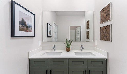 Discover new homes within the only gated community in Gladden Farms. Coronet at Gladden Farms, a premier D.R. Horton community where modern living meets the scenic charm of Marana, Arizona. Coronet offers residents the perfect blend of small-town warmth and modern amenities. Surrounded by 830 acres of green space, 28 parks, and 19 playgrounds, this gated community is designed for families who value both comfort and outdoor adventure. Residents of Coronet at Gladden Farms enjoy exclusive amenities such as a sparkling community pool, jacuzzi, fitness center, and a clubhouse complete with a BBQ area and patio. The community also offers walking trails, a dog park, and playgrounds, making it the ideal environment for families and active lifestyles. Each home is thoughtfully designed with high-end finishes, including quartz countertops, wood-look luxury vinyl plank flooring, tile roofs, Spanish Lace stucco exteriors and beautifully landscaped front yards with auto drip irrigation. Additionally, all homes feature covered front porches and back patios, perfect for enjoying the stunning Arizona sunsets and monsoons. Coronet at Gladden Farms is built with a commitment to energy efficiency and sustainability. Each home meets the DOE Zero Energy Ready Home standards, meaning they are constructed to be so energy-efficient that a renewable energy system could offset most or all of the home's annual energy use. These homes include advanced features such as tankless water heaters, energy-efficient LED lighting, and high-performance insulation, ensuring lower utility costs and a reduced environmental footprint. The Home is Connected Smart Home package, which includes a smart thermostat, video doorbell, keyless entry, a Wi-Fi-enabled garage door opener, and much more, provides modern convenience and enhanced security. Living in Coronet at Gladden Farms means being part of a thriving community with easy access to shopping, dining, and recreation. The greater Gladden Farms area is equipped with amenities like a splashpad, soccer fields, and the Paws & Claws Dog Park. Families will appreciate being part of the Marana Unified School District, with Gladden Farms Elementary nearby and a new K-8 school opening in 2025. Beyond the community, residents can explore the natural beauty of the area with proximity to Picacho Peak State Park, Tortolita Mountain Park, and Saguaro National Park, offering endless opportunities for hiking, cycling, and wildlife viewing. Experience the perfect blend of comfort, convenience, and community at Coronet at Gladden Farms—where new homes, energy efficiency, and a vibrant lifestyle await.