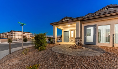 Discover new homes within the only gated community in Gladden Farms. Coronet at Gladden Farms, a premier D.R. Horton community where modern living meets the scenic charm of Marana, Arizona. Coronet offers residents the perfect blend of small-town warmth and modern amenities. Surrounded by 830 acres of green space, 28 parks, and 19 playgrounds, this gated community is designed for families who value both comfort and outdoor adventure. Residents of Coronet at Gladden Farms enjoy exclusive amenities such as a sparkling community pool, jacuzzi, fitness center, and a clubhouse complete with a BBQ area and patio. The community also offers walking trails, a dog park, and playgrounds, making it the ideal environment for families and active lifestyles. Each home is thoughtfully designed with high-end finishes, including quartz countertops, wood-look luxury vinyl plank flooring, tile roofs, Spanish Lace stucco exteriors and beautifully landscaped front yards with auto drip irrigation. Additionally, all homes feature covered front porches and back patios, perfect for enjoying the stunning Arizona sunsets and monsoons. Coronet at Gladden Farms is built with a commitment to energy efficiency and sustainability. Each home meets the DOE Zero Energy Ready Home standards, meaning they are constructed to be so energy-efficient that a renewable energy system could offset most or all of the home's annual energy use. These homes include advanced features such as tankless water heaters, energy-efficient LED lighting, and high-performance insulation, ensuring lower utility costs and a reduced environmental footprint. The Home is Connected Smart Home package, which includes a smart thermostat, video doorbell, keyless entry, a Wi-Fi-enabled garage door opener, and much more, provides modern convenience and enhanced security. Living in Coronet at Gladden Farms means being part of a thriving community with easy access to shopping, dining, and recreation. The greater Gladden Farms area is equipped with amenities like a splashpad, soccer fields, and the Paws & Claws Dog Park. Families will appreciate being part of the Marana Unified School District, with Gladden Farms Elementary nearby and a new K-8 school opening in 2025. Beyond the community, residents can explore the natural beauty of the area with proximity to Picacho Peak State Park, Tortolita Mountain Park, and Saguaro National Park, offering endless opportunities for hiking, cycling, and wildlife viewing. Experience the perfect blend of comfort, convenience, and community at Coronet at Gladden Farms—where new homes, energy efficiency, and a vibrant lifestyle await.