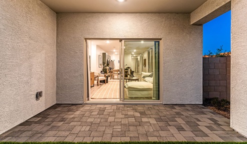 Discover new homes within the only gated community in Gladden Farms. Coronet at Gladden Farms, a premier D.R. Horton community where modern living meets the scenic charm of Marana, Arizona. Coronet offers residents the perfect blend of small-town warmth and modern amenities. Surrounded by 830 acres of green space, 28 parks, and 19 playgrounds, this gated community is designed for families who value both comfort and outdoor adventure. Residents of Coronet at Gladden Farms enjoy exclusive amenities such as a sparkling community pool, jacuzzi, fitness center, and a clubhouse complete with a BBQ area and patio. The community also offers walking trails, a dog park, and playgrounds, making it the ideal environment for families and active lifestyles. Each home is thoughtfully designed with high-end finishes, including quartz countertops, wood-look luxury vinyl plank flooring, tile roofs, Spanish Lace stucco exteriors and beautifully landscaped front yards with auto drip irrigation. Additionally, all homes feature covered front porches and back patios, perfect for enjoying the stunning Arizona sunsets and monsoons. Coronet at Gladden Farms is built with a commitment to energy efficiency and sustainability. Each home meets the DOE Zero Energy Ready Home standards, meaning they are constructed to be so energy-efficient that a renewable energy system could offset most or all of the home's annual energy use. These homes include advanced features such as tankless water heaters, energy-efficient LED lighting, and high-performance insulation, ensuring lower utility costs and a reduced environmental footprint. The Home is Connected Smart Home package, which includes a smart thermostat, video doorbell, keyless entry, a Wi-Fi-enabled garage door opener, and much more, provides modern convenience and enhanced security. Living in Coronet at Gladden Farms means being part of a thriving community with easy access to shopping, dining, and recreation. The greater Gladden Farms area is equipped with amenities like a splashpad, soccer fields, and the Paws & Claws Dog Park. Families will appreciate being part of the Marana Unified School District, with Gladden Farms Elementary nearby and a new K-8 school opening in 2025. Beyond the community, residents can explore the natural beauty of the area with proximity to Picacho Peak State Park, Tortolita Mountain Park, and Saguaro National Park, offering endless opportunities for hiking, cycling, and wildlife viewing. Experience the perfect blend of comfort, convenience, and community at Coronet at Gladden Farms—where new homes, energy efficiency, and a vibrant lifestyle await.