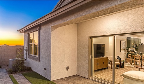 Discover new homes within the only gated community in Gladden Farms. Coronet at Gladden Farms, a premier D.R. Horton community where modern living meets the scenic charm of Marana, Arizona. Coronet offers residents the perfect blend of small-town warmth and modern amenities. Surrounded by 830 acres of green space, 28 parks, and 19 playgrounds, this gated community is designed for families who value both comfort and outdoor adventure. Residents of Coronet at Gladden Farms enjoy exclusive amenities such as a sparkling community pool, jacuzzi, fitness center, and a clubhouse complete with a BBQ area and patio. The community also offers walking trails, a dog park, and playgrounds, making it the ideal environment for families and active lifestyles. Each home is thoughtfully designed with high-end finishes, including quartz countertops, wood-look luxury vinyl plank flooring, tile roofs, Spanish Lace stucco exteriors and beautifully landscaped front yards with auto drip irrigation. Additionally, all homes feature covered front porches and back patios, perfect for enjoying the stunning Arizona sunsets and monsoons. Coronet at Gladden Farms is built with a commitment to energy efficiency and sustainability. Each home meets the DOE Zero Energy Ready Home standards, meaning they are constructed to be so energy-efficient that a renewable energy system could offset most or all of the home's annual energy use. These homes include advanced features such as tankless water heaters, energy-efficient LED lighting, and high-performance insulation, ensuring lower utility costs and a reduced environmental footprint. The Home is Connected Smart Home package, which includes a smart thermostat, video doorbell, keyless entry, a Wi-Fi-enabled garage door opener, and much more, provides modern convenience and enhanced security. Living in Coronet at Gladden Farms means being part of a thriving community with easy access to shopping, dining, and recreation. The greater Gladden Farms area is equipped with amenities like a splashpad, soccer fields, and the Paws & Claws Dog Park. Families will appreciate being part of the Marana Unified School District, with Gladden Farms Elementary nearby and a new K-8 school opening in 2025. Beyond the community, residents can explore the natural beauty of the area with proximity to Picacho Peak State Park, Tortolita Mountain Park, and Saguaro National Park, offering endless opportunities for hiking, cycling, and wildlife viewing. Experience the perfect blend of comfort, convenience, and community at Coronet at Gladden Farms—where new homes, energy efficiency, and a vibrant lifestyle await.