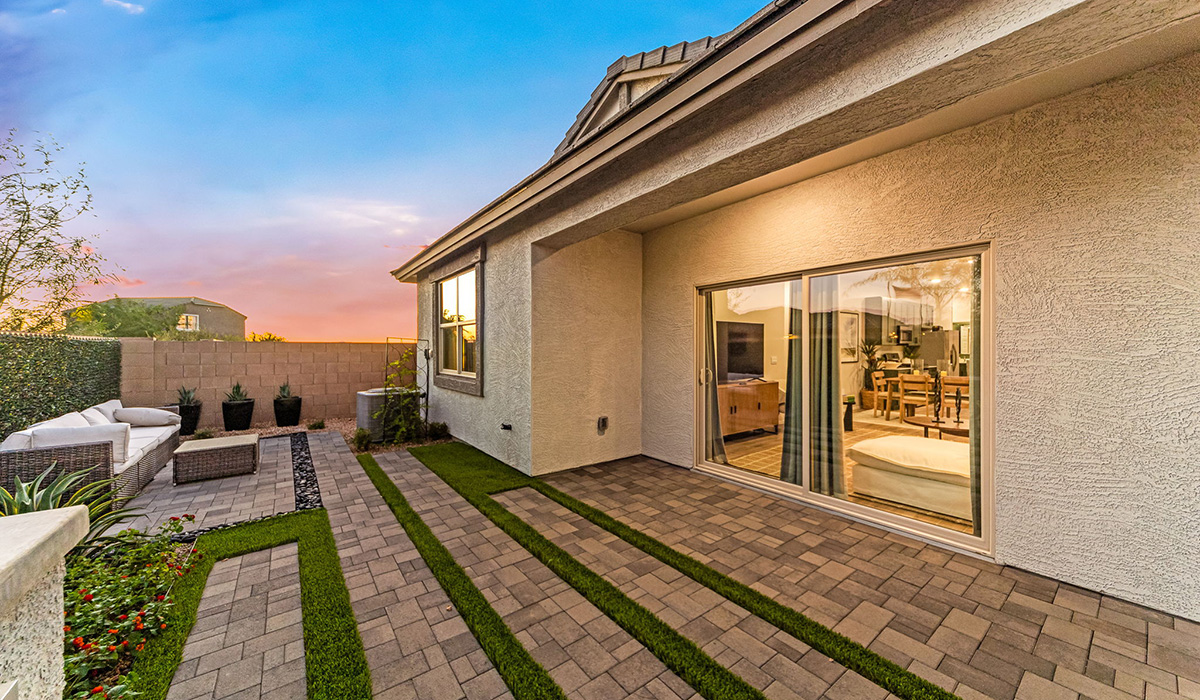 Discover new homes within the only gated community in Gladden Farms. Coronet at Gladden Farms, a premier D.R. Horton community where modern living meets the scenic charm of Marana, Arizona. Coronet offers residents the perfect blend of small-town warmth and modern amenities. Surrounded by 830 acres of green space, 28 parks, and 19 playgrounds, this gated community is designed for families who value both comfort and outdoor adventure.  Residents of Coronet at Gladden Farms enjoy exclusive amenities such as a sparkling community pool, jacuzzi, fitness center, and a clubhouse complete with a BBQ area and patio. The community also offers walking trails, a dog park, and playgrounds, making it the ideal environment for families and active lifestyles. Each home is thoughtfully designed with high-end finishes, including quartz countertops, wood-look luxury vinyl plank flooring, tile roofs, Spanish Lace stucco exteriors and beautifully landscaped front yards with auto drip irrigation. Additionally, all homes feature covered front porches and back patios, perfect for enjoying the stunning Arizona sunsets and monsoons.  Coronet at Gladden Farms is built with a commitment to energy efficiency and sustainability. Each home meets the DOE Zero Energy Ready Home standards, meaning they are constructed to be so energy-efficient that a renewable energy system could offset most or all of the home's annual energy use. These homes include advanced features such as tankless water heaters, energy-efficient LED lighting, and high-performance insulation, ensuring lower utility costs and a reduced environmental footprint. The Home is Connected Smart Home package, which includes a smart thermostat, video doorbell, keyless entry, a Wi-Fi-enabled garage door opener, and much more, provides modern convenience and enhanced security.  Living in Coronet at Gladden Farms means being part of a thriving community with easy access to shopping, dining, and recreation. The greater Gladden Farms area is equipped with amenities like a splashpad, soccer fields, and the Paws & Claws Dog Park. Families will appreciate being part of the Marana Unified School District, with Gladden Farms Elementary nearby and a new K-8 school opening in 2025.  Beyond the community, residents can explore the natural beauty of the area with proximity to Picacho Peak State Park, Tortolita Mountain Park, and Saguaro National Park, offering endless opportunities for hiking, cycling, and wildlife viewing. Experience the perfect blend of comfort, convenience, and community at Coronet at Gladden Farms—where new homes, energy efficiency, and a vibrant lifestyle await.