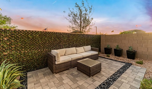 Discover new homes within the only gated community in Gladden Farms. Coronet at Gladden Farms, a premier D.R. Horton community where modern living meets the scenic charm of Marana, Arizona. Coronet offers residents the perfect blend of small-town warmth and modern amenities. Surrounded by 830 acres of green space, 28 parks, and 19 playgrounds, this gated community is designed for families who value both comfort and outdoor adventure. Residents of Coronet at Gladden Farms enjoy exclusive amenities such as a sparkling community pool, jacuzzi, fitness center, and a clubhouse complete with a BBQ area and patio. The community also offers walking trails, a dog park, and playgrounds, making it the ideal environment for families and active lifestyles. Each home is thoughtfully designed with high-end finishes, including quartz countertops, wood-look luxury vinyl plank flooring, tile roofs, Spanish Lace stucco exteriors and beautifully landscaped front yards with auto drip irrigation. Additionally, all homes feature covered front porches and back patios, perfect for enjoying the stunning Arizona sunsets and monsoons. Coronet at Gladden Farms is built with a commitment to energy efficiency and sustainability. Each home meets the DOE Zero Energy Ready Home standards, meaning they are constructed to be so energy-efficient that a renewable energy system could offset most or all of the home's annual energy use. These homes include advanced features such as tankless water heaters, energy-efficient LED lighting, and high-performance insulation, ensuring lower utility costs and a reduced environmental footprint. The Home is Connected Smart Home package, which includes a smart thermostat, video doorbell, keyless entry, a Wi-Fi-enabled garage door opener, and much more, provides modern convenience and enhanced security. Living in Coronet at Gladden Farms means being part of a thriving community with easy access to shopping, dining, and recreation. The greater Gladden Farms area is equipped with amenities like a splashpad, soccer fields, and the Paws & Claws Dog Park. Families will appreciate being part of the Marana Unified School District, with Gladden Farms Elementary nearby and a new K-8 school opening in 2025. Beyond the community, residents can explore the natural beauty of the area with proximity to Picacho Peak State Park, Tortolita Mountain Park, and Saguaro National Park, offering endless opportunities for hiking, cycling, and wildlife viewing. Experience the perfect blend of comfort, convenience, and community at Coronet at Gladden Farms—where new homes, energy efficiency, and a vibrant lifestyle await.