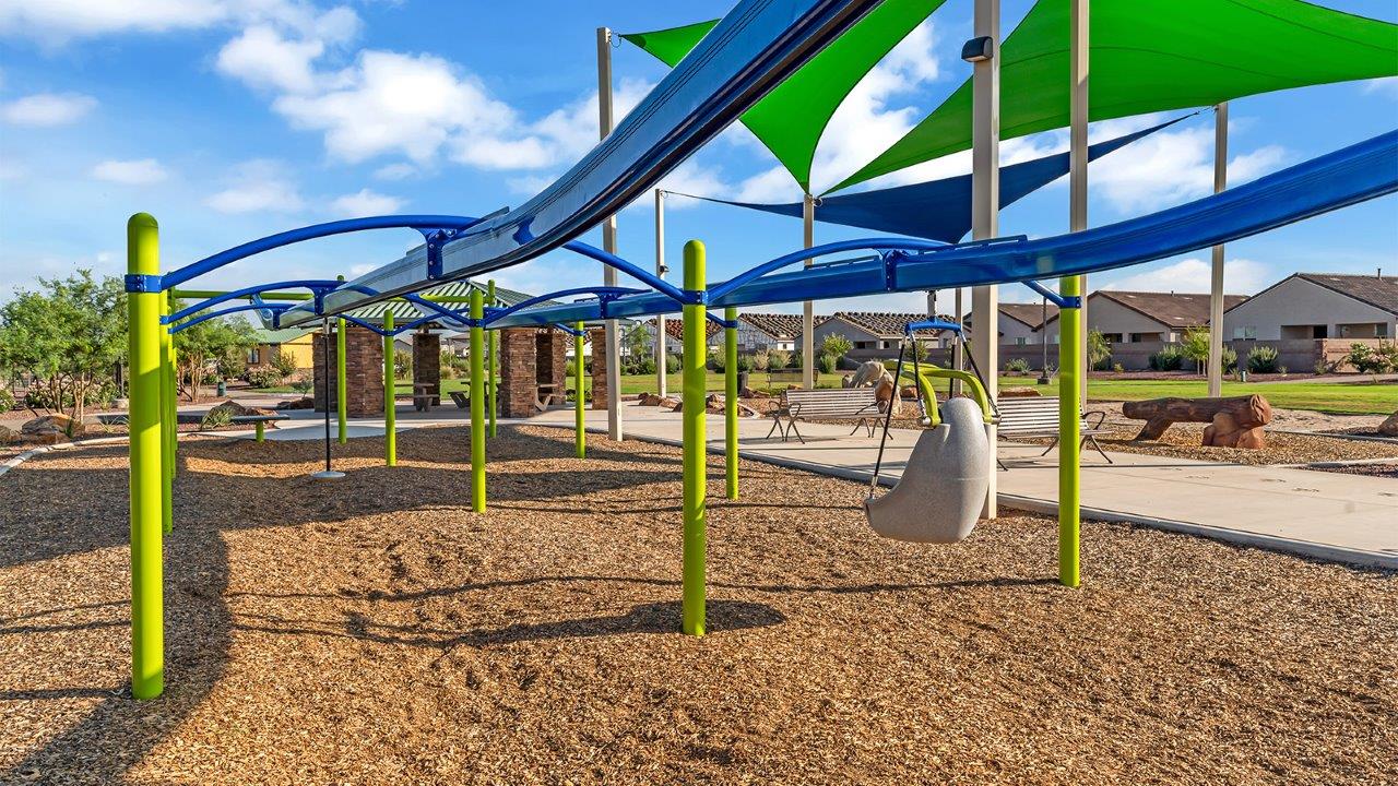 Welcome to The Amber at Coronet at Gladden Farms in Marana, Arizona – a thoughtfully designed 1,330 sq. ft. single-story new home that perfectly combines modern convenience with the natural beauty of the surrounding landscape.  As you step through the inviting front porch, you’re greeted by a smartly arranged entryway that opens into the heart of the home. The great room serves as the central gathering place, seamlessly connecting to the dining area and kitchen, creating an open and inviting space that’s perfect for both everyday living and entertaining.  The kitchen, designed with both style and functionality in mind, features quartz countertops, modern appliances, and a pantry that provides ample storage. The adjacent dining area offers a comfortable setting for meals, while the open layout ensures that the kitchen, dining, and living spaces are always connected.  At the rear of the home, the master suite offers a peaceful retreat. The spacious bedroom leads to a well-appointed en-suite bathroom, complete with dual vanities, a walk-in shower, and a large walk-in closet, providing both comfort and convenience.  The Amber also includes two additional bedrooms, each offering plenty of space and natural light. These rooms are conveniently located near a second full bathroom, making them ideal for family members or guests.  Additional features of the home include a utility room and direct access to a two-car garage, adding practicality to the overall design. Step outside to the covered patio, where you can enjoy the stunning Arizona sunsets and the tranquil surroundings of Coronet at Gladden Farms.  Built with energy efficiency in mind, The Amber at Coronet at Gladden Farms is a DOE Zero Energy Ready Home, offering a sustainable lifestyle with lower utility costs and a reduced environmental footprint.