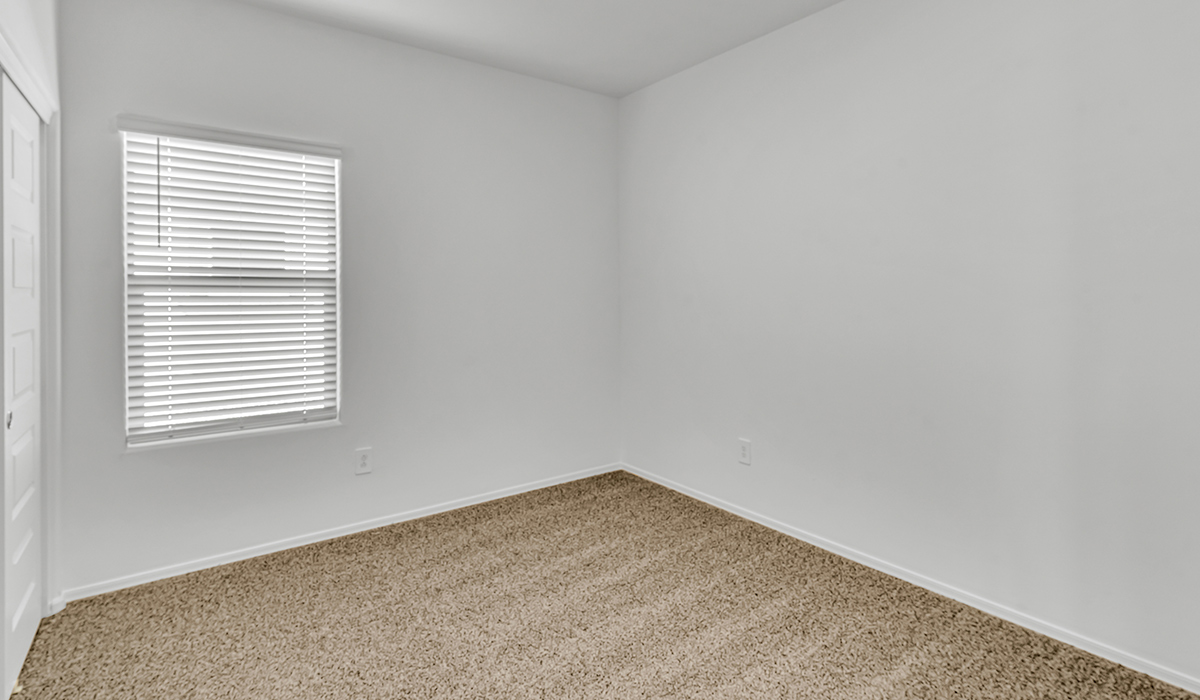 Welcome to The Amber at Coronet at Gladden Farms in Marana, Arizona – a thoughtfully designed 1,330 sq. ft. single-story new home that perfectly combines modern convenience with the natural beauty of the surrounding landscape.  As you step through the inviting front porch, you’re greeted by a smartly arranged entryway that opens into the heart of the home. The great room serves as the central gathering place, seamlessly connecting to the dining area and kitchen, creating an open and inviting space that’s perfect for both everyday living and entertaining.  The kitchen, designed with both style and functionality in mind, features quartz countertops, modern appliances, and a pantry that provides ample storage. The adjacent dining area offers a comfortable setting for meals, while the open layout ensures that the kitchen, dining, and living spaces are always connected.  At the rear of the home, the primary suite offers a peaceful retreat. The spacious bedroom leads to a well-appointed en-suite bathroom, complete with dual vanities, a walk-in shower, and a large walk-in closet, providing both comfort and convenience.  The Amber also includes two additional bedrooms, each offering plenty of space and natural light. These rooms are conveniently located near a second full bathroom, making them ideal for family members or guests.  Additional features of the home include a utility room and direct access to a two-car garage, adding practicality to the overall design. Step outside to the covered patio, where you can enjoy the stunning Arizona sunsets and the tranquil surroundings of Coronet at Gladden Farms.  Built with energy efficiency in mind, The Amber at Coronet at Gladden Farms is a DOE Zero Energy Ready Home, offering a sustainable lifestyle with lower utility costs and a reduced environmental footprint.