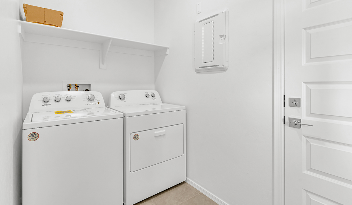 Welcome to The Amber at Coronet at Gladden Farms in Marana, Arizona – a thoughtfully designed 1,330 sq. ft. single-story new home that perfectly combines modern convenience with the natural beauty of the surrounding landscape.  As you step through the inviting front porch, you’re greeted by a smartly arranged entryway that opens into the heart of the home. The great room serves as the central gathering place, seamlessly connecting to the dining area and kitchen, creating an open and inviting space that’s perfect for both everyday living and entertaining.  The kitchen, designed with both style and functionality in mind, features quartz countertops, modern appliances, and a pantry that provides ample storage. The adjacent dining area offers a comfortable setting for meals, while the open layout ensures that the kitchen, dining, and living spaces are always connected.  At the rear of the home, the primary suite offers a peaceful retreat. The spacious bedroom leads to a well-appointed en-suite bathroom, complete with dual vanities, a walk-in shower, and a large walk-in closet, providing both comfort and convenience.  The Amber also includes two additional bedrooms, each offering plenty of space and natural light. These rooms are conveniently located near a second full bathroom, making them ideal for family members or guests.  Additional features of the home include a utility room and direct access to a two-car garage, adding practicality to the overall design. Step outside to the covered patio, where you can enjoy the stunning Arizona sunsets and the tranquil surroundings of Coronet at Gladden Farms.  Built with energy efficiency in mind, The Amber at Coronet at Gladden Farms is a DOE Zero Energy Ready Home, offering a sustainable lifestyle with lower utility costs and a reduced environmental footprint.