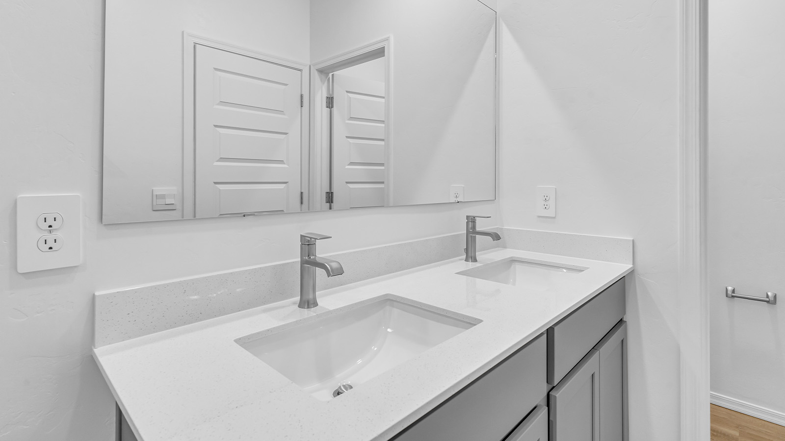 Introducing The Brooke at Coronet at Gladden Farms in Marana, Arizona – a unique 1,654 sq. ft. single-story new home designed for those who seek both comfort and style in a picturesque setting. Exclusively available at Coronet at Gladden Farms, this floorplan offers a one-of-a-kind living experience you won’t find anywhere else.  As you enter through the welcoming front porch, you’ll find yourself in a well-designed entryway that leads into the heart of the home. The great room, with its open and airy layout, is the perfect spot for gathering with family and friends. It flows seamlessly into the dining area and kitchen, creating an inviting space that’s ideal for everything from casual meals to entertaining guests.  The kitchen is the centerpiece of this home, featuring quartz countertops, modern appliances, and a large pantry that provides ample storage. The adjacent dining area offers a comfortable setting for meals, and the open-concept design ensures that the kitchen, dining, and living spaces are always connected.  The Brooke offers a well-thought-out floor plan with four bedrooms, making it perfect for families of all sizes. The master suite, located at the rear of the home, provides a private retreat with a spacious bedroom, a walk-in closet, and an en-suite bathroom complete with dual vanities and a walk-in shower. The additional three bedrooms are thoughtfully positioned near the second full bathroom, ensuring comfort and convenience for all.  A utility room and a two-car garage add practicality to the overall design, while the covered patio extends your living space outdoors. Here, you can enjoy Arizona’s beautiful weather and the stunning views that Coronet at Gladden Farms has to offer.  Designed with energy efficiency in mind, The Brooke at Coronet at Gladden Farms is a DOE Zero Energy Ready Home, providing a sustainable lifestyle with lower utility costs and a reduced environmental footprint.