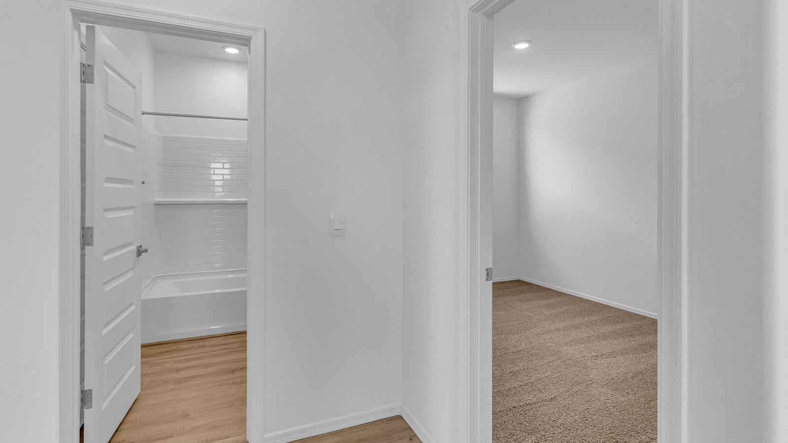 Introducing The Brooke at Coronet at Gladden Farms in Marana, Arizona – a unique 1,654 sq. ft. single-story new home designed for those who seek both comfort and style in a picturesque setting. Exclusively available at Coronet at Gladden Farms, this floorplan offers a one-of-a-kind living experience you won’t find anywhere else.  As you enter through the welcoming front porch, you’ll find yourself in a well-designed entryway that leads into the heart of the home. The great room, with its open and airy layout, is the perfect spot for gathering with family and friends. It flows seamlessly into the dining area and kitchen, creating an inviting space that’s ideal for everything from casual meals to entertaining guests.  The kitchen is the centerpiece of this home, featuring quartz countertops, modern appliances, and a large pantry that provides ample storage. The adjacent dining area offers a comfortable setting for meals, and the open-concept design ensures that the kitchen, dining, and living spaces are always connected.  The Brooke offers a well-thought-out floor plan with four bedrooms, making it perfect for families of all sizes. The master suite, located at the rear of the home, provides a private retreat with a spacious bedroom, a walk-in closet, and an en-suite bathroom complete with dual vanities and a walk-in shower. The additional three bedrooms are thoughtfully positioned near the second full bathroom, ensuring comfort and convenience for all.  A utility room and a two-car garage add practicality to the overall design, while the covered patio extends your living space outdoors. Here, you can enjoy Arizona’s beautiful weather and the stunning views that Coronet at Gladden Farms has to offer.  Designed with energy efficiency in mind, The Brooke at Coronet at Gladden Farms is a DOE Zero Energy Ready Home, providing a sustainable lifestyle with lower utility costs and a reduced environmental footprint.