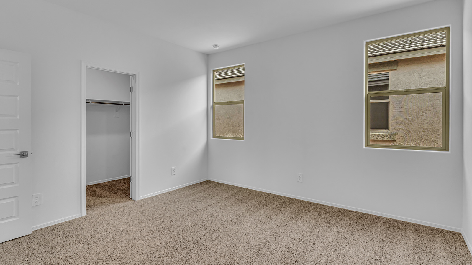 Introducing The Brooke at Coronet at Gladden Farms in Marana, Arizona – a unique 1,654 sq. ft. single-story new home designed for those who seek both comfort and style in a picturesque setting. Exclusively available at Coronet at Gladden Farms, this floorplan offers a one-of-a-kind living experience you won’t find anywhere else.  As you enter through the welcoming front porch, you’ll find yourself in a well-designed entryway that leads into the heart of the home. The great room, with its open and airy layout, is the perfect spot for gathering with family and friends. It flows seamlessly into the dining area and kitchen, creating an inviting space that’s ideal for everything from casual meals to entertaining guests.  The kitchen is the centerpiece of this home, featuring quartz countertops, modern appliances, and a large pantry that provides ample storage. The adjacent dining area offers a comfortable setting for meals, and the open-concept design ensures that the kitchen, dining, and living spaces are always connected.  The Brooke offers a well-thought-out floor plan with four bedrooms, making it perfect for families of all sizes. The master suite, located at the rear of the home, provides a private retreat with a spacious bedroom, a walk-in closet, and an en-suite bathroom complete with dual vanities and a walk-in shower. The additional three bedrooms are thoughtfully positioned near the second full bathroom, ensuring comfort and convenience for all.  A utility room and a two-car garage add practicality to the overall design, while the covered patio extends your living space outdoors. Here, you can enjoy Arizona’s beautiful weather and the stunning views that Coronet at Gladden Farms has to offer.  Designed with energy efficiency in mind, The Brooke at Coronet at Gladden Farms is a DOE Zero Energy Ready Home, providing a sustainable lifestyle with lower utility costs and a reduced environmental footprint.