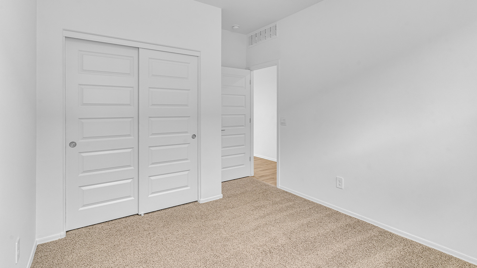 Introducing The Brooke at Coronet at Gladden Farms in Marana, Arizona – a unique 1,654 sq. ft. single-story new home designed for those who seek both comfort and style in a picturesque setting. Exclusively available at Coronet at Gladden Farms, this floorplan offers a one-of-a-kind living experience you won’t find anywhere else.  As you enter through the welcoming front porch, you’ll find yourself in a well-designed entryway that leads into the heart of the home. The great room, with its open and airy layout, is the perfect spot for gathering with family and friends. It flows seamlessly into the dining area and kitchen, creating an inviting space that’s ideal for everything from casual meals to entertaining guests.  The kitchen is the centerpiece of this home, featuring quartz countertops, modern appliances, and a large pantry that provides ample storage. The adjacent dining area offers a comfortable setting for meals, and the open-concept design ensures that the kitchen, dining, and living spaces are always connected.  The Brooke offers a well-thought-out floor plan with four bedrooms, making it perfect for families of all sizes. The master suite, located at the rear of the home, provides a private retreat with a spacious bedroom, a walk-in closet, and an en-suite bathroom complete with dual vanities and a walk-in shower. The additional three bedrooms are thoughtfully positioned near the second full bathroom, ensuring comfort and convenience for all.  A utility room and a two-car garage add practicality to the overall design, while the covered patio extends your living space outdoors. Here, you can enjoy Arizona’s beautiful weather and the stunning views that Coronet at Gladden Farms has to offer.  Designed with energy efficiency in mind, The Brooke at Coronet at Gladden Farms is a DOE Zero Energy Ready Home, providing a sustainable lifestyle with lower utility costs and a reduced environmental footprint.