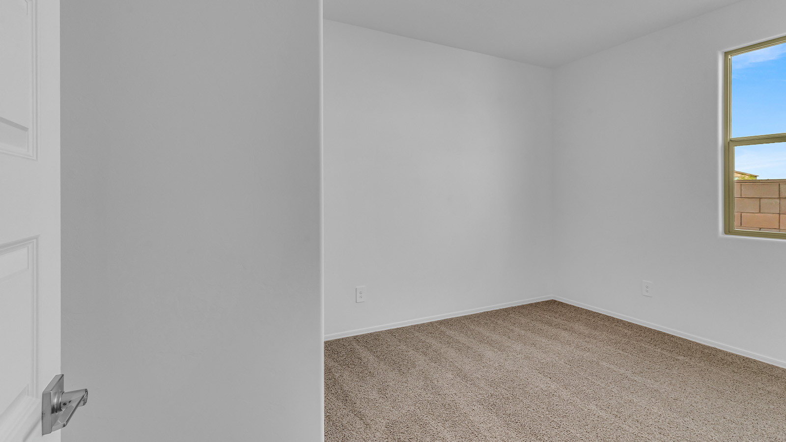 Introducing The Brooke at Coronet at Gladden Farms in Marana, Arizona – a unique 1,654 sq. ft. single-story new home designed for those who seek both comfort and style in a picturesque setting. Exclusively available at Coronet at Gladden Farms, this floorplan offers a one-of-a-kind living experience you won’t find anywhere else.  As you enter through the welcoming front porch, you’ll find yourself in a well-designed entryway that leads into the heart of the home. The great room, with its open and airy layout, is the perfect spot for gathering with family and friends. It flows seamlessly into the dining area and kitchen, creating an inviting space that’s ideal for everything from casual meals to entertaining guests.  The kitchen is the centerpiece of this home, featuring quartz countertops, modern appliances, and a large pantry that provides ample storage. The adjacent dining area offers a comfortable setting for meals, and the open-concept design ensures that the kitchen, dining, and living spaces are always connected.  The Brooke offers a well-thought-out floor plan with four bedrooms, making it perfect for families of all sizes. The master suite, located at the rear of the home, provides a private retreat with a spacious bedroom, a walk-in closet, and an en-suite bathroom complete with dual vanities and a walk-in shower. The additional three bedrooms are thoughtfully positioned near the second full bathroom, ensuring comfort and convenience for all.  A utility room and a two-car garage add practicality to the overall design, while the covered patio extends your living space outdoors. Here, you can enjoy Arizona’s beautiful weather and the stunning views that Coronet at Gladden Farms has to offer.  Designed with energy efficiency in mind, The Brooke at Coronet at Gladden Farms is a DOE Zero Energy Ready Home, providing a sustainable lifestyle with lower utility costs and a reduced environmental footprint.