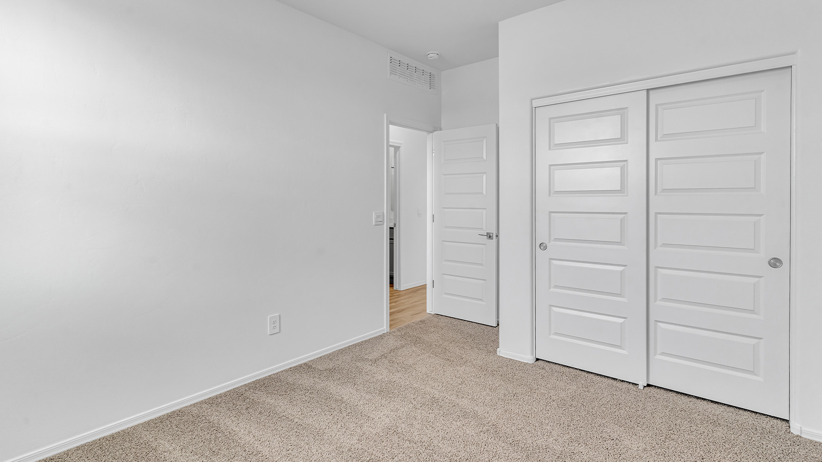 Introducing The Brooke at Coronet at Gladden Farms in Marana, Arizona – a unique 1,654 sq. ft. single-story new home designed for those who seek both comfort and style in a picturesque setting. Exclusively available at Coronet at Gladden Farms, this floorplan offers a one-of-a-kind living experience you won’t find anywhere else.  As you enter through the welcoming front porch, you’ll find yourself in a well-designed entryway that leads into the heart of the home. The great room, with its open and airy layout, is the perfect spot for gathering with family and friends. It flows seamlessly into the dining area and kitchen, creating an inviting space that’s ideal for everything from casual meals to entertaining guests.  The kitchen is the centerpiece of this home, featuring quartz countertops, modern appliances, and a large pantry that provides ample storage. The adjacent dining area offers a comfortable setting for meals, and the open-concept design ensures that the kitchen, dining, and living spaces are always connected.  The Brooke offers a well-thought-out floor plan with four bedrooms, making it perfect for families of all sizes. The master suite, located at the rear of the home, provides a private retreat with a spacious bedroom, a walk-in closet, and an en-suite bathroom complete with dual vanities and a walk-in shower. The additional three bedrooms are thoughtfully positioned near the second full bathroom, ensuring comfort and convenience for all.  A utility room and a two-car garage add practicality to the overall design, while the covered patio extends your living space outdoors. Here, you can enjoy Arizona’s beautiful weather and the stunning views that Coronet at Gladden Farms has to offer.  Designed with energy efficiency in mind, The Brooke at Coronet at Gladden Farms is a DOE Zero Energy Ready Home, providing a sustainable lifestyle with lower utility costs and a reduced environmental footprint.