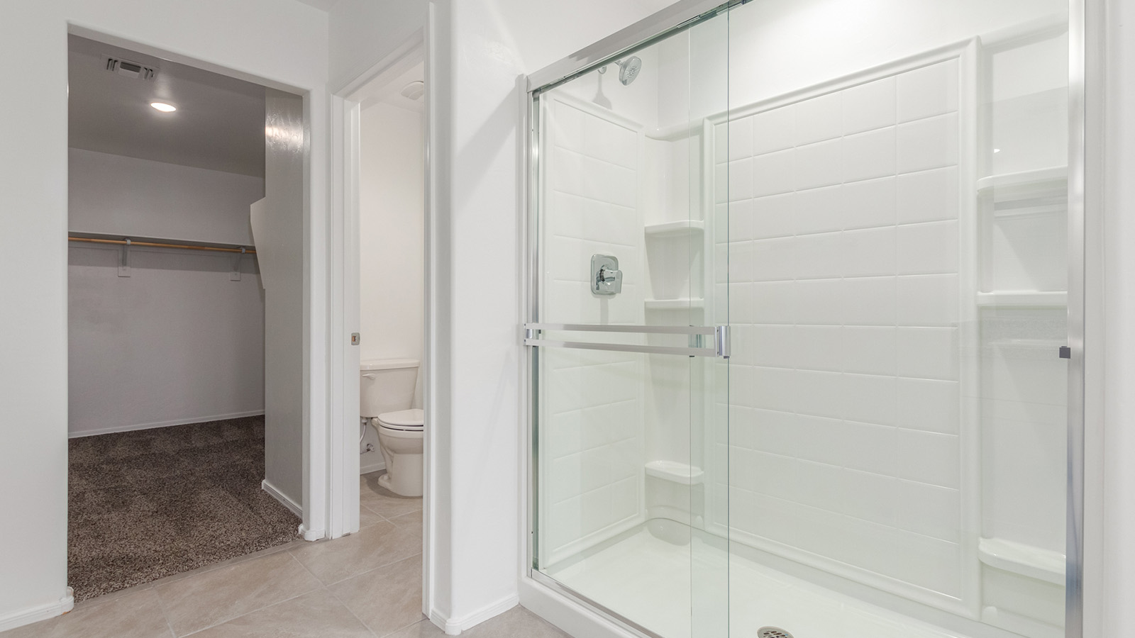 Introducing The Grace at Coronet at Gladden Farms in Marana, Arizona – a spacious 1,965 sq. ft. two-story home that combines modern living with the charm of a vibrant community.  As you enter through the welcoming front porch, the entryway leads you into the open layout of the main floor. Here, the great room seamlessly connects to the dining area and kitchen, creating a perfect space for family gatherings and entertaining. The kitchen, equipped with quartz countertops, modern appliances, and a large pantry, is as functional as it is stylish, making meal preparation a pleasure.  The main floor also features a convenient powder room for guests, as well as direct access to the two-car garage, enhancing the home’s practicality. Just off the kitchen, the covered patio extends your living space outdoors, providing a great spot to enjoy Arizona’s beautiful weather.  Heading upstairs, you’ll find the family’s private quarters. The primary suite offers a peaceful retreat, complete with a generously sized bedroom, a large walk-in closet, and an en-suite bathroom with walk-in shower. The upper level also includes three additional bedrooms, a full bathroom, and a centrally located utility room for added convenience. A versatile loft area provides additional living space that can be customized to suit your family’s needs.  The Grace is designed with energy efficiency in mind. This DOE Zero Energy Ready Home offers a sustainable lifestyle with advanced features like tankless water heaters, energy-efficient LED lighting, and high-performance insulation, ensuring lower utility costs and a reduced environmental footprint.  Living at Coronet at Gladden Farms means enjoying a community that values both comfort and outdoor adventure. With access to 830 acres of green space, parks, playgrounds, and exclusive amenities like a sparkling pool, fitness center, and clubhouse, this community is perfect for families and active lifestyles.