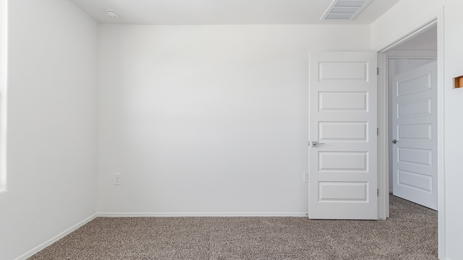 Introducing The Grace at Coronet at Gladden Farms in Marana, Arizona – a spacious 1,965 sq. ft. two-story home that combines modern living with the charm of a vibrant community.  As you enter through the welcoming front porch, the entryway leads you into the open layout of the main floor. Here, the great room seamlessly connects to the dining area and kitchen, creating a perfect space for family gatherings and entertaining. The kitchen, equipped with quartz countertops, modern appliances, and a large pantry, is as functional as it is stylish, making meal preparation a pleasure.  The main floor also features a convenient powder room for guests, as well as direct access to the two-car garage, enhancing the home’s practicality. Just off the kitchen, the covered patio extends your living space outdoors, providing a great spot to enjoy Arizona’s beautiful weather.  Heading upstairs, you’ll find the family’s private quarters. The primary suite offers a peaceful retreat, complete with a generously sized bedroom, a large walk-in closet, and an en-suite bathroom with walk-in shower. The upper level also includes three additional bedrooms, a full bathroom, and a centrally located utility room for added convenience. A versatile loft area provides additional living space that can be customized to suit your family’s needs.  The Grace is designed with energy efficiency in mind. This DOE Zero Energy Ready Home offers a sustainable lifestyle with advanced features like tankless water heaters, energy-efficient LED lighting, and high-performance insulation, ensuring lower utility costs and a reduced environmental footprint.  Living at Coronet at Gladden Farms means enjoying a community that values both comfort and outdoor adventure. With access to 830 acres of green space, parks, playgrounds, and exclusive amenities like a sparkling pool, fitness center, and clubhouse, this community is perfect for families and active lifestyles.