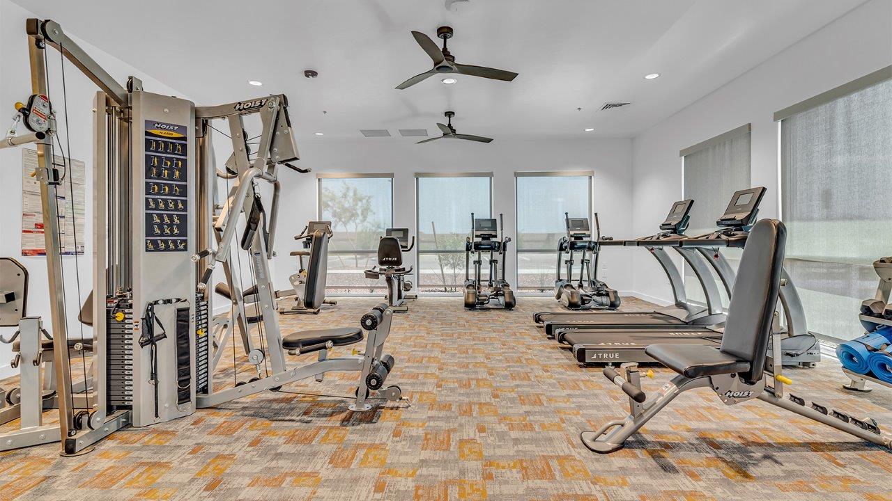 Introducing The Grace at Coronet at Gladden Farms in Marana, Arizona – a spacious 1,965 sq. ft. two-story home that combines modern living with the charm of a vibrant community.  As you enter through the welcoming front porch, the entryway leads you into the open layout of the main floor. Here, the great room seamlessly connects to the dining area and kitchen, creating a perfect space for family gatherings and entertaining. The kitchen is equipped with modern appliances and ample storage space, making meal preparation and entertaining a pleasure.  The main floor also features a convenient powder room for guests, as well as direct access to the two-car garage, enhancing the home’s practicality.  Heading upstairs, you’ll find the homes private quarters. The primary suite offers a peaceful retreat, complete with a generously sized bedroom, a large walk-in closet, and an en-suite bathroom with walk-in shower. The upper level also includes three additional bedrooms, a full bathroom, and a centrally located utility room for added convenience. A versatile loft area provides additional living space that can be customized to suit your family’s needs.  The Grace is designed with energy efficiency in mind and features a tankless water heater, energy-efficient LED lighting, and high-performance insulation, helping to lower utility costs.  Living at Coronet at Gladden Farms means enjoying a community that values both comfort and outdoor adventure. With access to 830 acres of green space, parks, playgrounds, and exclusive amenities like a sparkling pool, fitness center, and clubhouse, this community is perfect for families and active lifestyles.