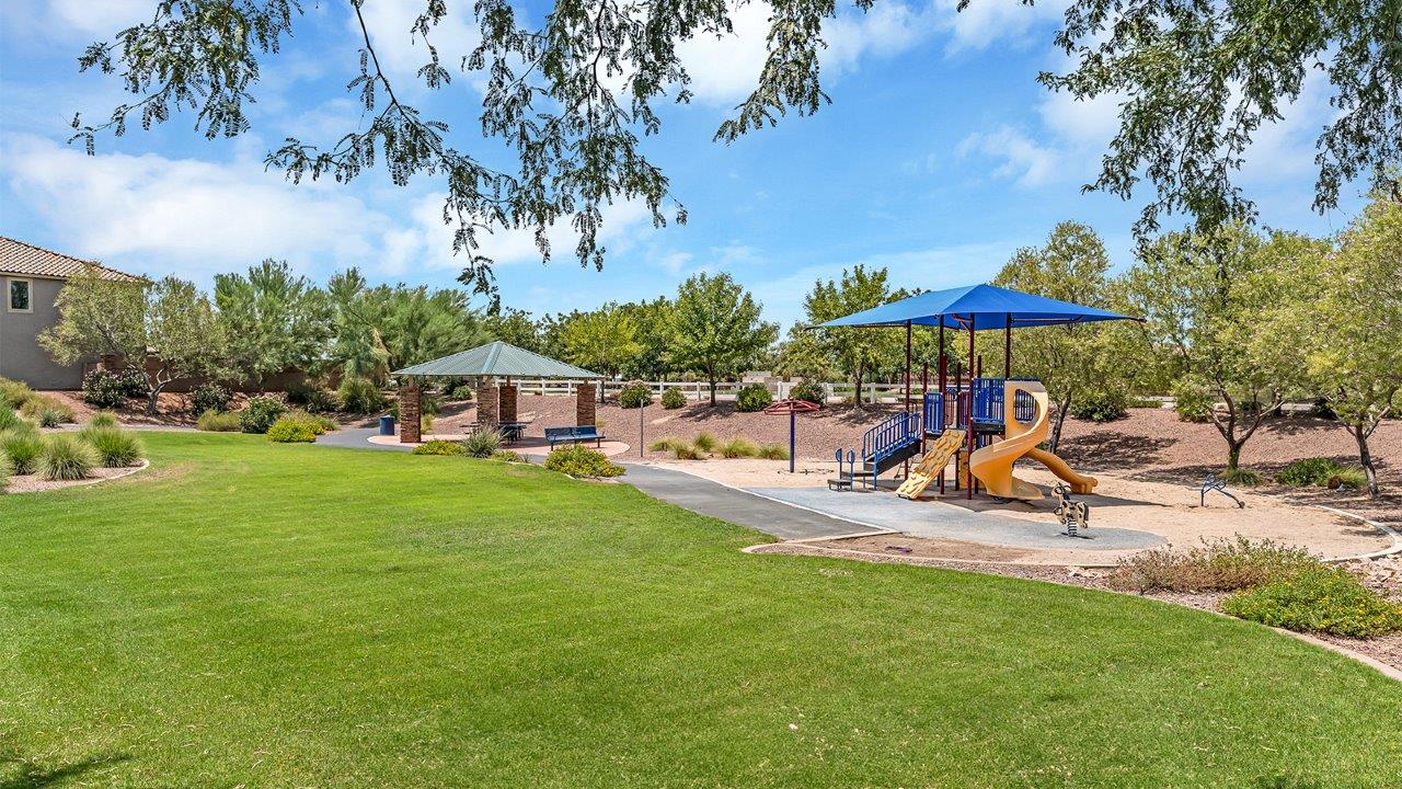 Introducing The Grace at Coronet at Gladden Farms in Marana, Arizona – a spacious 1,965 sq. ft. two-story home that combines modern living with the charm of a vibrant community.  As you enter through the welcoming front porch, the entryway leads you into the open layout of the main floor. Here, the great room seamlessly connects to the dining area and kitchen, creating a perfect space for family gatherings and entertaining. The kitchen is equipped with modern appliances and ample storage space, making meal preparation and entertaining a pleasure.  The main floor also features a convenient powder room for guests, as well as direct access to the two-car garage, enhancing the home’s practicality.  Heading upstairs, you’ll find the homes private quarters. The primary suite offers a peaceful retreat, complete with a generously sized bedroom, a large walk-in closet, and an en-suite bathroom with walk-in shower. The upper level also includes three additional bedrooms, a full bathroom, and a centrally located utility room for added convenience. A versatile loft area provides additional living space that can be customized to suit your family’s needs.  The Grace is designed with energy efficiency in mind and features a tankless water heater, energy-efficient LED lighting, and high-performance insulation, helping to lower utility costs.  Living at Coronet at Gladden Farms means enjoying a community that values both comfort and outdoor adventure. With access to 830 acres of green space, parks, playgrounds, and exclusive amenities like a sparkling pool, fitness center, and clubhouse, this community is perfect for families and active lifestyles.