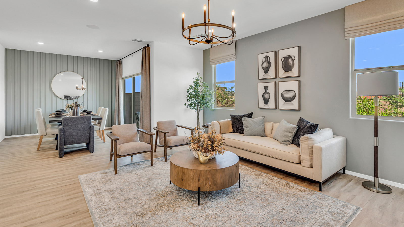 Welcome to The Kate at Coronet at Gladden Farms in Marana, Arizona – a spacious 2,227 sq. ft. two-story home designed to offer both luxury and practicality in a vibrant community setting.  As you step through the welcoming front porch, you’re greeted by an expansive entryway that leads into the heart of the home. The main floor features a generous great room that seamlessly flows into the dining area and kitchen, creating a perfect space for family gatherings and entertaining guests. The kitchen is a chef’s delight with modern appliances and ample storage space.  The main floor also includes a convenient powder room for guests and direct access to the two-car garage, enhancing the home’s functionality.  Upstairs, the primary suite offers a peaceful retreat, complete with a spacious bedroom, a large walk-in closet, and an en-suite bathroom and a walk-in shower. The upper level also includes three additional bedrooms, a full bathroom, and a centrally located utility room for added convenience. A versatile loft area provides additional living space, perfect for a playroom, home office, or secondary lounge.  The Kate in Coronet at Gladden Farms is designed with energy efficiency at its core featuring advanced energy-saving technologies such as a tankless water heater, energy-efficient LED lighting, and high-performance spray foam insulation, helping to lower utility costs.  Living at Coronet at Gladden Farms means more than just having a beautiful home. Residents enjoy access to 830 acres of green space, 28 parks, 19 playgrounds, and exclusive amenities like a sparkling community pool, fitness center, and clubhouse. The gated community also offers walking trails, a dog park, and close proximity to everyday conveniences, making it an ideal environment for families and active lifestyles.