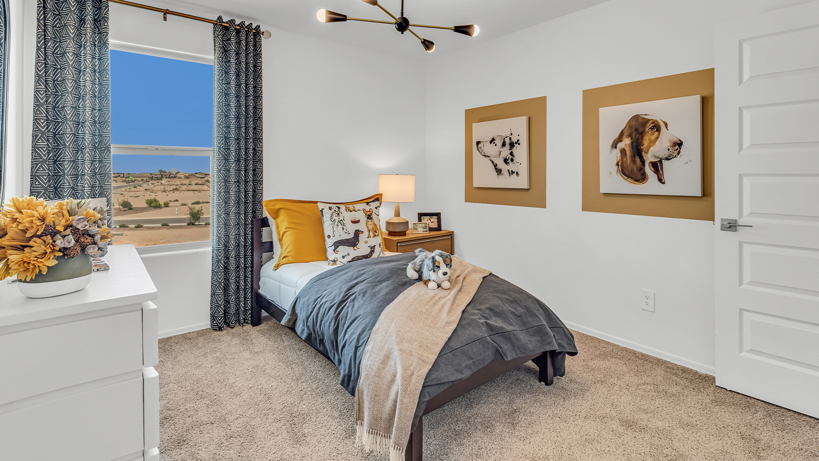 Welcome to The Kate at Coronet at Gladden Farms in Marana, Arizona – a spacious 2,227 sq. ft. two-story home designed to offer both luxury and practicality in a vibrant community setting.  As you step through the welcoming front porch, you’re greeted by an expansive entryway that leads into the heart of the home. The main floor features a generous great room that seamlessly flows into the dining area and kitchen, creating a perfect space for family gatherings and entertaining guests. The kitchen is a chef’s delight with modern appliances and ample storage space.  The main floor also includes a convenient powder room for guests and direct access to the two-car garage, enhancing the home’s functionality.  Upstairs, the primary suite offers a peaceful retreat, complete with a spacious bedroom, a large walk-in closet, and an en-suite bathroom and a walk-in shower. The upper level also includes three additional bedrooms, a full bathroom, and a centrally located utility room for added convenience. A versatile loft area provides additional living space, perfect for a playroom, home office, or secondary lounge.  The Kate in Coronet at Gladden Farms is designed with energy efficiency at its core featuring advanced energy-saving technologies such as a tankless water heater, energy-efficient LED lighting, and high-performance spray foam insulation, helping to lower utility costs.  Living at Coronet at Gladden Farms means more than just having a beautiful home. Residents enjoy access to 830 acres of green space, 28 parks, 19 playgrounds, and exclusive amenities like a sparkling community pool, fitness center, and clubhouse. The gated community also offers walking trails, a dog park, and close proximity to everyday conveniences, making it an ideal environment for families and active lifestyles.