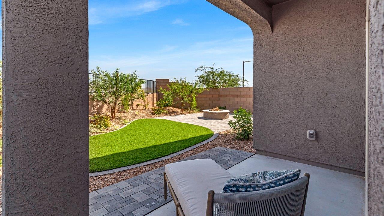 Welcome to The Kate at Coronet at Gladden Farms in Marana, Arizona – a spacious 2,227 sq. ft. two-story home designed to offer both luxury and practicality in a vibrant community setting.  As you step through the welcoming front porch, you’re greeted by an expansive entryway that leads into the heart of the home. The main floor features a generous great room that seamlessly flows into the dining area and kitchen, creating a perfect space for family gatherings and entertaining guests. The kitchen is a chef’s delight with modern appliances and ample storage space.  The main floor also includes a convenient powder room for guests and direct access to the two-car garage, enhancing the home’s functionality.  Upstairs, the primary suite offers a peaceful retreat, complete with a spacious bedroom, a large walk-in closet, and an en-suite bathroom and a walk-in shower. The upper level also includes three additional bedrooms, a full bathroom, and a centrally located utility room for added convenience. A versatile loft area provides additional living space, perfect for a playroom, home office, or secondary lounge.  The Kate in Coronet at Gladden Farms is designed with energy efficiency at its core featuring advanced energy-saving technologies such as a tankless water heater, energy-efficient LED lighting, and high-performance spray foam insulation, helping to lower utility costs.  Living at Coronet at Gladden Farms means more than just having a beautiful home. Residents enjoy access to 830 acres of green space, 28 parks, 19 playgrounds, and exclusive amenities like a sparkling community pool, fitness center, and clubhouse. The gated community also offers walking trails, a dog park, and close proximity to everyday conveniences, making it an ideal environment for families and active lifestyles.