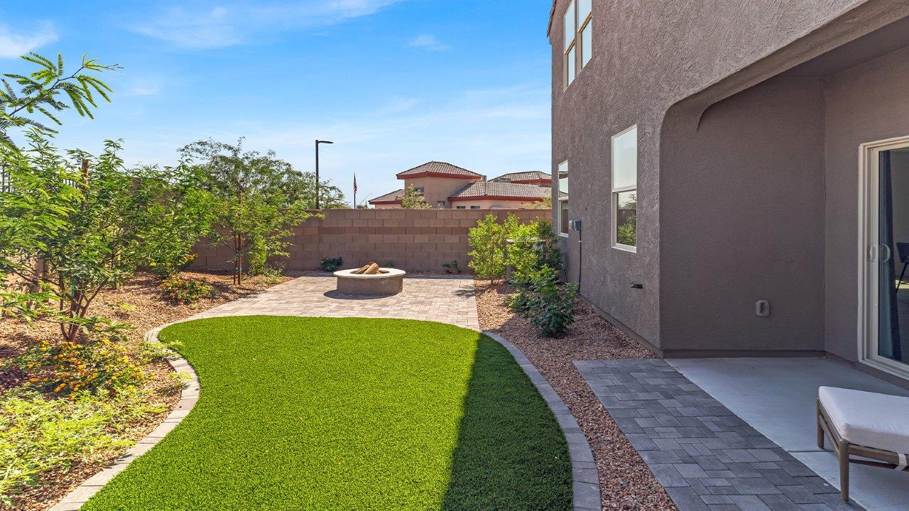 Welcome to The Kate at Coronet at Gladden Farms in Marana, Arizona – a spacious 2,227 sq. ft. two-story home designed to offer both luxury and practicality in a vibrant community setting.  As you step through the welcoming front porch, you’re greeted by an expansive entryway that leads into the heart of the home. The main floor features a generous great room that seamlessly flows into the dining area and kitchen, creating a perfect space for family gatherings and entertaining guests. The kitchen is a chef’s delight with modern appliances and ample storage space.  The main floor also includes a convenient powder room for guests and direct access to the two-car garage, enhancing the home’s functionality.  Upstairs, the primary suite offers a peaceful retreat, complete with a spacious bedroom, a large walk-in closet, and an en-suite bathroom and a walk-in shower. The upper level also includes three additional bedrooms, a full bathroom, and a centrally located utility room for added convenience. A versatile loft area provides additional living space, perfect for a playroom, home office, or secondary lounge.  The Kate in Coronet at Gladden Farms is designed with energy efficiency at its core featuring advanced energy-saving technologies such as a tankless water heater, energy-efficient LED lighting, and high-performance spray foam insulation, helping to lower utility costs.  Living at Coronet at Gladden Farms means more than just having a beautiful home. Residents enjoy access to 830 acres of green space, 28 parks, 19 playgrounds, and exclusive amenities like a sparkling community pool, fitness center, and clubhouse. The gated community also offers walking trails, a dog park, and close proximity to everyday conveniences, making it an ideal environment for families and active lifestyles.