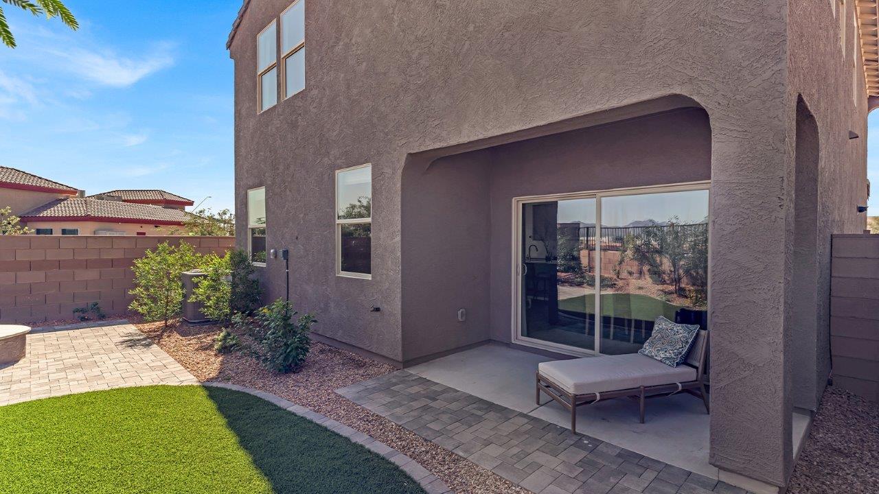 Welcome to The Kate at Coronet at Gladden Farms in Marana, Arizona – a spacious 2,227 sq. ft. two-story home designed to offer both luxury and practicality in a vibrant community setting.  As you step through the welcoming front porch, you’re greeted by an expansive entryway that leads into the heart of the home. The main floor features a generous great room that seamlessly flows into the dining area and kitchen, creating a perfect space for family gatherings and entertaining guests. The kitchen is a chef’s delight with modern appliances and ample storage space.  The main floor also includes a convenient powder room for guests and direct access to the two-car garage, enhancing the home’s functionality.  Upstairs, the primary suite offers a peaceful retreat, complete with a spacious bedroom, a large walk-in closet, and an en-suite bathroom and a walk-in shower. The upper level also includes three additional bedrooms, a full bathroom, and a centrally located utility room for added convenience. A versatile loft area provides additional living space, perfect for a playroom, home office, or secondary lounge.  The Kate in Coronet at Gladden Farms is designed with energy efficiency at its core featuring advanced energy-saving technologies such as a tankless water heater, energy-efficient LED lighting, and high-performance spray foam insulation, helping to lower utility costs.  Living at Coronet at Gladden Farms means more than just having a beautiful home. Residents enjoy access to 830 acres of green space, 28 parks, 19 playgrounds, and exclusive amenities like a sparkling community pool, fitness center, and clubhouse. The gated community also offers walking trails, a dog park, and close proximity to everyday conveniences, making it an ideal environment for families and active lifestyles.
