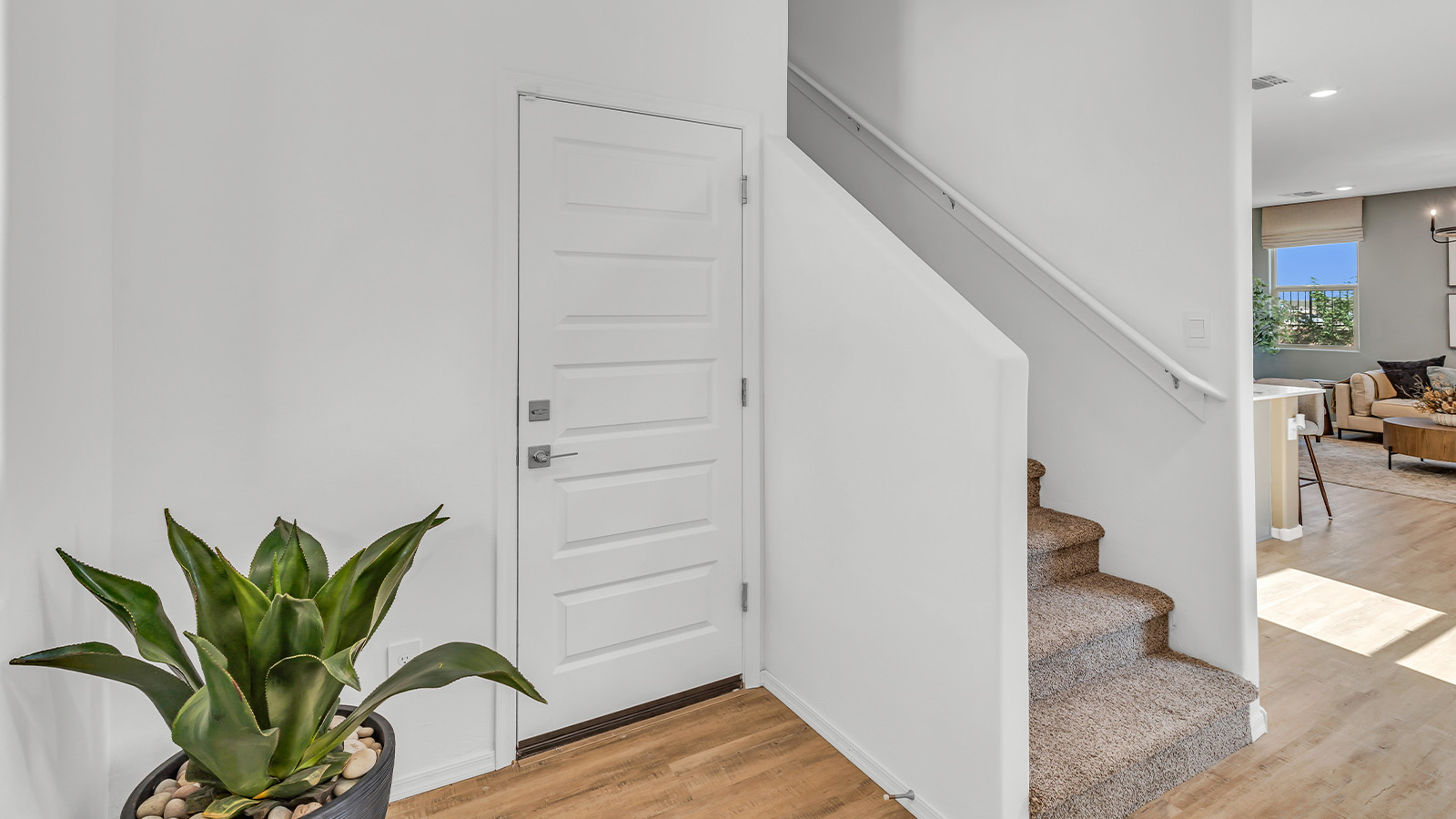 Welcome to The Kate at Coronet at Gladden Farms in Marana, Arizona – a spacious 2,227 sq. ft. two-story home designed to offer both luxury and practicality in a vibrant community setting.  As you step through the welcoming front porch, you’re greeted by an expansive entryway that leads into the heart of the home. The main floor features a generous great room that seamlessly flows into the dining area and kitchen, creating a perfect space for family gatherings and entertaining guests. The kitchen is a chef’s delight, boasting quartz countertops, a large island with a breakfast bar, modern appliances, and a walk-in pantry that provides ample storage.  The main floor also includes a convenient powder room for guests and direct access to the two-car garage, enhancing the home’s functionality. Just off the kitchen and dining room, a covered patio invites you to enjoy the beautiful Arizona weather, offering a serene spot for outdoor dining or relaxation.  Upstairs, the master suite offers a peaceful retreat, complete with a spacious bedroom, a large walk-in closet, and an en-suite bathroom featuring dual vanities and a walk-in shower. The upper level also includes three additional bedrooms, a full bathroom, and a centrally located utility room for added convenience. A versatile loft area provides additional living space, perfect for a playroom, home office, or secondary lounge.  The Kate in Coronet at Gladden Farms is designed with energy efficiency at its core. This DOE Zero Energy Ready Home features advanced energy-saving technologies such as tankless water heaters, energy-efficient LED lighting, and high-performance spray foam insulation, ensuring lower utility costs and a reduced environmental footprint.  Living at Coronet at Gladden Farms means more than just having a beautiful home. Residents enjoy access to 830 acres of green space, 28 parks, 19 playgrounds, and exclusive amenities like a sparkling community pool, fitness center, and clubhouse. The gated community also offers walking trails, a dog park, and close proximity to everyday conveniences, making it an ideal environment for families and active lifestyles.  *Images shown are for reference only. They depict the sales model home and may not represent the actual home.