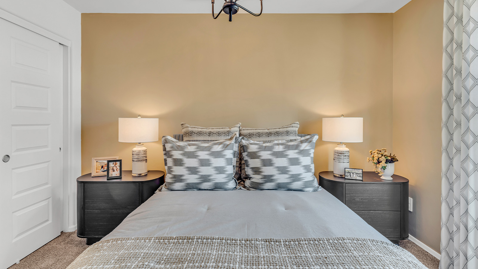 Welcome to The Kate at Coronet at Gladden Farms in Marana, Arizona – a spacious 2,227 sq. ft. two-story home designed to offer both luxury and practicality in a vibrant community setting.  As you step through the welcoming front porch, you’re greeted by an expansive entryway that leads into the heart of the home. The main floor features a generous great room that seamlessly flows into the dining area and kitchen, creating a perfect space for family gatherings and entertaining guests. The kitchen is a chef’s delight, boasting quartz countertops, a large island with a breakfast bar, modern appliances, and a walk-in pantry that provides ample storage.  The main floor also includes a convenient powder room for guests and direct access to the two-car garage, enhancing the home’s functionality. Just off the kitchen and dining room, a covered patio invites you to enjoy the beautiful Arizona weather, offering a serene spot for outdoor dining or relaxation.  Upstairs, the master suite offers a peaceful retreat, complete with a spacious bedroom, a large walk-in closet, and an en-suite bathroom featuring dual vanities and a walk-in shower. The upper level also includes three additional bedrooms, a full bathroom, and a centrally located utility room for added convenience. A versatile loft area provides additional living space, perfect for a playroom, home office, or secondary lounge.  The Kate in Coronet at Gladden Farms is designed with energy efficiency at its core. This DOE Zero Energy Ready Home features advanced energy-saving technologies such as tankless water heaters, energy-efficient LED lighting, and high-performance spray foam insulation, ensuring lower utility costs and a reduced environmental footprint.  Living at Coronet at Gladden Farms means more than just having a beautiful home. Residents enjoy access to 830 acres of green space, 28 parks, 19 playgrounds, and exclusive amenities like a sparkling community pool, fitness center, and clubhouse. The gated community also offers walking trails, a dog park, and close proximity to everyday conveniences, making it an ideal environment for families and active lifestyles.  *Images shown are for reference only. They depict the sales model home and may not represent the actual home.