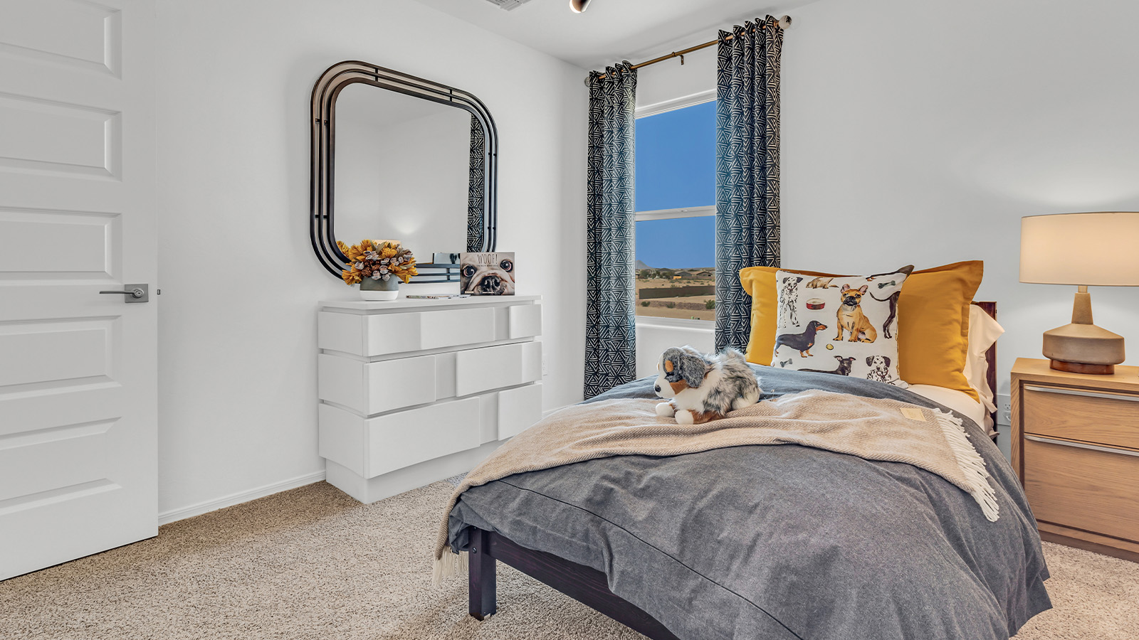 Welcome to The Kate at Coronet at Gladden Farms in Marana, Arizona – a spacious 2,227 sq. ft. two-story home designed to offer both luxury and practicality in a vibrant community setting.  As you step through the welcoming front porch, you’re greeted by an expansive entryway that leads into the heart of the home. The main floor features a generous great room that seamlessly flows into the dining area and kitchen, creating a perfect space for family gatherings and entertaining guests. The kitchen is a chef’s delight, boasting quartz countertops, a large island with a breakfast bar, modern appliances, and a walk-in pantry that provides ample storage.  The main floor also includes a convenient powder room for guests and direct access to the two-car garage, enhancing the home’s functionality. Just off the kitchen and dining room, a covered patio invites you to enjoy the beautiful Arizona weather, offering a serene spot for outdoor dining or relaxation.  Upstairs, the master suite offers a peaceful retreat, complete with a spacious bedroom, a large walk-in closet, and an en-suite bathroom featuring dual vanities and a walk-in shower. The upper level also includes three additional bedrooms, a full bathroom, and a centrally located utility room for added convenience. A versatile loft area provides additional living space, perfect for a playroom, home office, or secondary lounge.  The Kate in Coronet at Gladden Farms is designed with energy efficiency at its core. This DOE Zero Energy Ready Home features advanced energy-saving technologies such as tankless water heaters, energy-efficient LED lighting, and high-performance spray foam insulation, ensuring lower utility costs and a reduced environmental footprint.  Living at Coronet at Gladden Farms means more than just having a beautiful home. Residents enjoy access to 830 acres of green space, 28 parks, 19 playgrounds, and exclusive amenities like a sparkling community pool, fitness center, and clubhouse. The gated community also offers walking trails, a dog park, and close proximity to everyday conveniences, making it an ideal environment for families and active lifestyles.