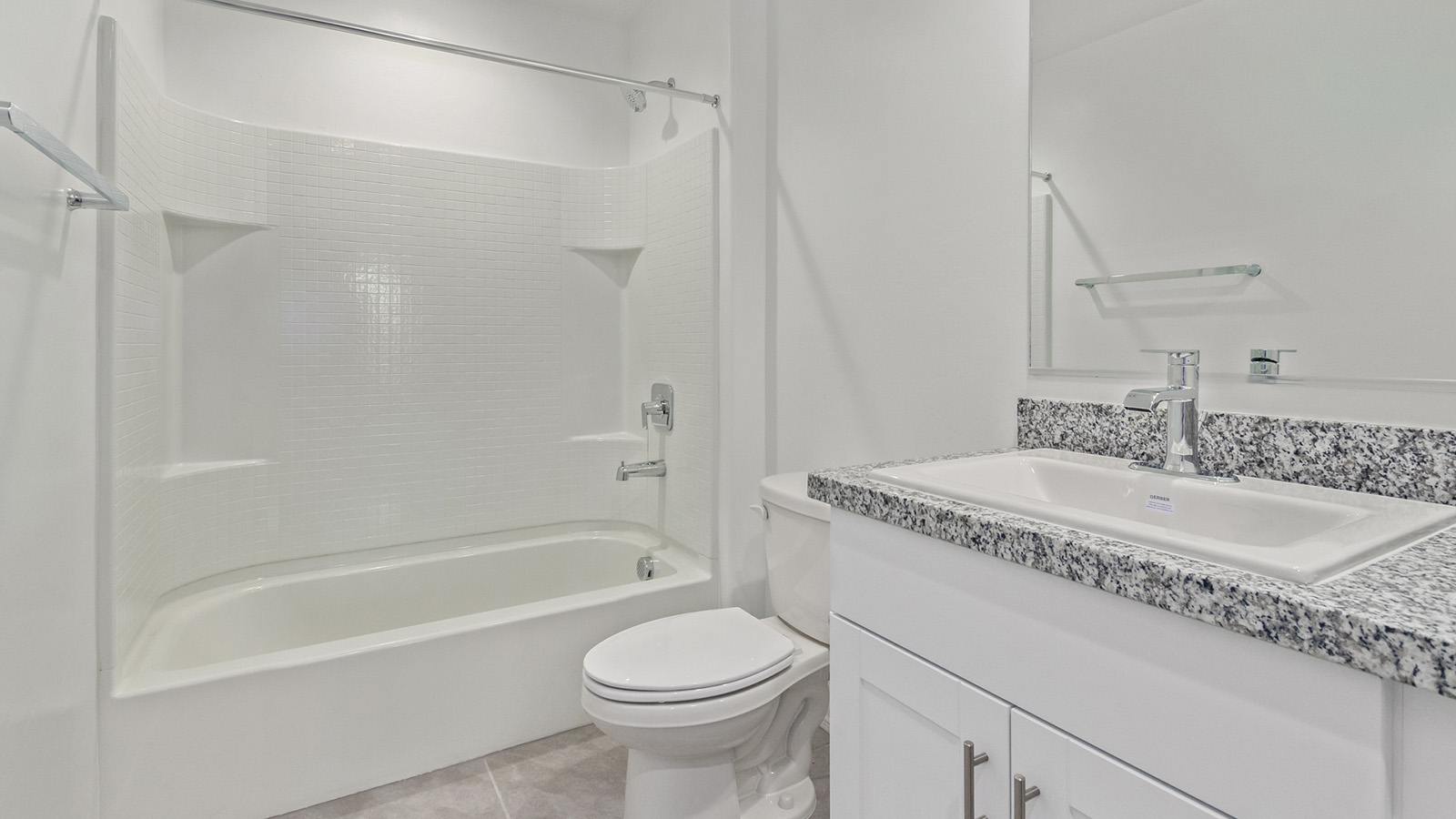 Welcome to The Madison within Coronet at Gladden Farms in Marana, Arizona – the largest new home in the community, offering an expansive 2,542 sq. ft. of living space designed to meet the needs of modern families.  As you step through the front porch, you’re welcomed into an entryway that opens up to the heart of the home. The main floor features a spacious great room that flows seamlessly into the dining area and kitchen, making it an ideal space for family gatherings and entertaining. The kitchen is a standout with its quartz countertops, large island, modern appliances, and a walk-in pantry.  On the main level, you'll also find a convenient bedroom and full bathroom, perfect for guests or as a private office space. The main floor’s design ensures both comfort and functionality, with direct access to the two-car garage and a covered patio that extends your living space outdoors.  Upstairs, the master suite offers a true retreat. The spacious bedroom leads to a large walk-in closet and an en-suite bathroom featuring dual vanities and a walk-in shower. The upper level also includes three additional bedrooms, a full bathroom, and a versatile loft area that can serve as a game room, home office, or second living area. A centrally located utility room adds convenience to everyday living.  Living at Coronet at Gladden Farms offers more than just a beautiful home. Residents enjoy exclusive amenities like a sparkling community pool, jacuzzi, fitness center, and clubhouse, along with access to 830 acres of green space, parks, playgrounds, and walking trails. This community is perfect for families who appreciate both comfort and outdoor adventure.  The Madison at Coronet at Gladden Farms is built with energy efficiency in mind, meeting DOE Zero Energy Ready Home standards. This means advanced features like tankless water heaters, energy-efficient LED lighting, and high-performance insulation are standard, ensuring lower utility costs and a reduced environmental footprint.