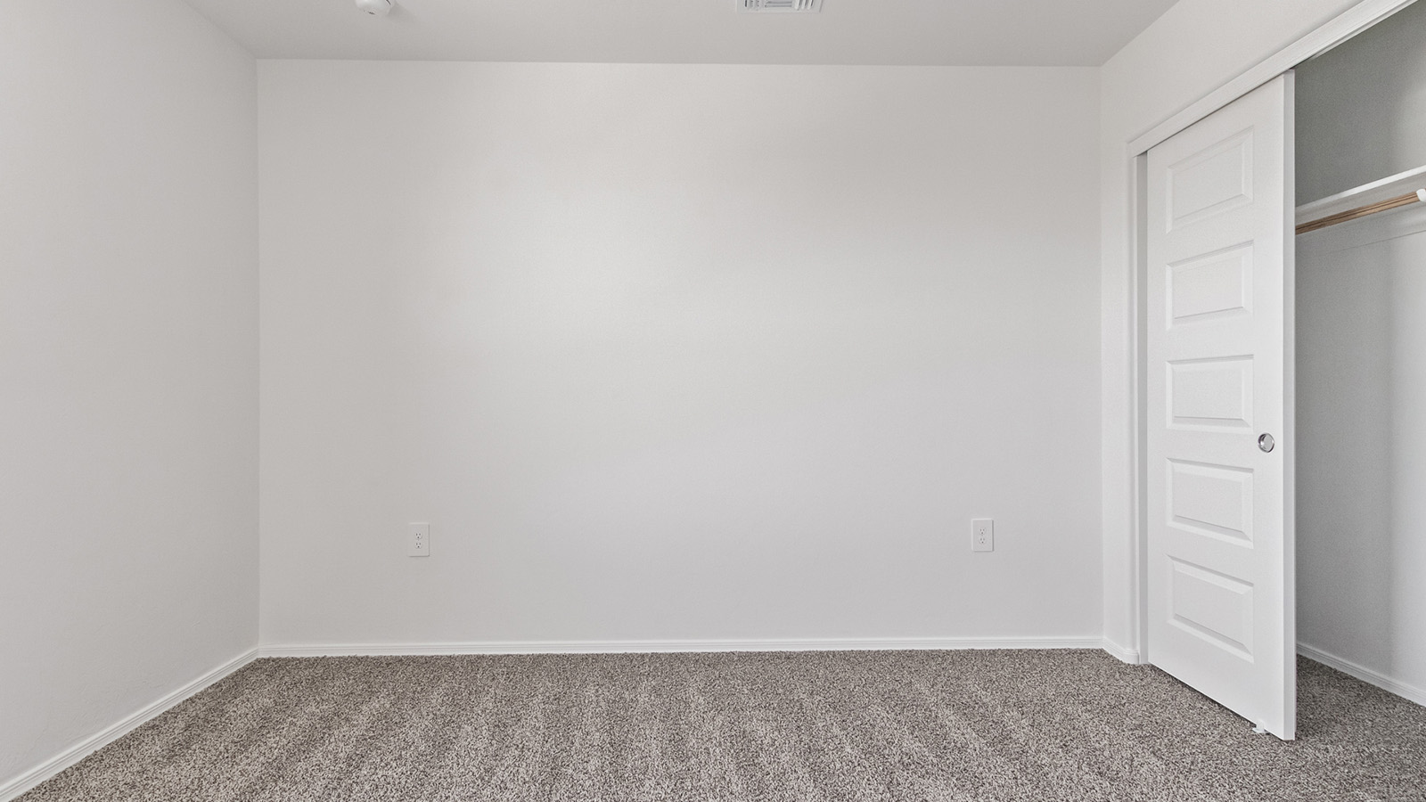 Welcome to The Madison within Coronet at Gladden Farms in Marana, Arizona – the largest new home in the community, offering an expansive 2,542 sq. ft. of living space designed to meet the needs of modern families.  As you step through the front porch, you’re welcomed into an entryway that opens up to the heart of the home. The main floor features a spacious great room that flows seamlessly into the dining area and kitchen, making it an ideal space for family gatherings and entertaining. The kitchen is a standout with its quartz countertops, large island, modern appliances, and a walk-in pantry.  On the main level, you'll also find a convenient bedroom and full bathroom, perfect for guests or as a private office space. The main floor’s design ensures both comfort and functionality, with direct access to the two-car garage and a covered patio that extends your living space outdoors.  Upstairs, the master suite offers a true retreat. The spacious bedroom leads to a large walk-in closet and an en-suite bathroom featuring dual vanities and a walk-in shower. The upper level also includes three additional bedrooms, a full bathroom, and a versatile loft area that can serve as a game room, home office, or second living area. A centrally located utility room adds convenience to everyday living.  Living at Coronet at Gladden Farms offers more than just a beautiful home. Residents enjoy exclusive amenities like a sparkling community pool, jacuzzi, fitness center, and clubhouse, along with access to 830 acres of green space, parks, playgrounds, and walking trails. This community is perfect for families who appreciate both comfort and outdoor adventure.  The Madison at Coronet at Gladden Farms is built with energy efficiency in mind, meeting DOE Zero Energy Ready Home standards. This means advanced features like tankless water heaters, energy-efficient LED lighting, and high-performance insulation are standard, ensuring lower utility costs and a reduced environmental footprint.