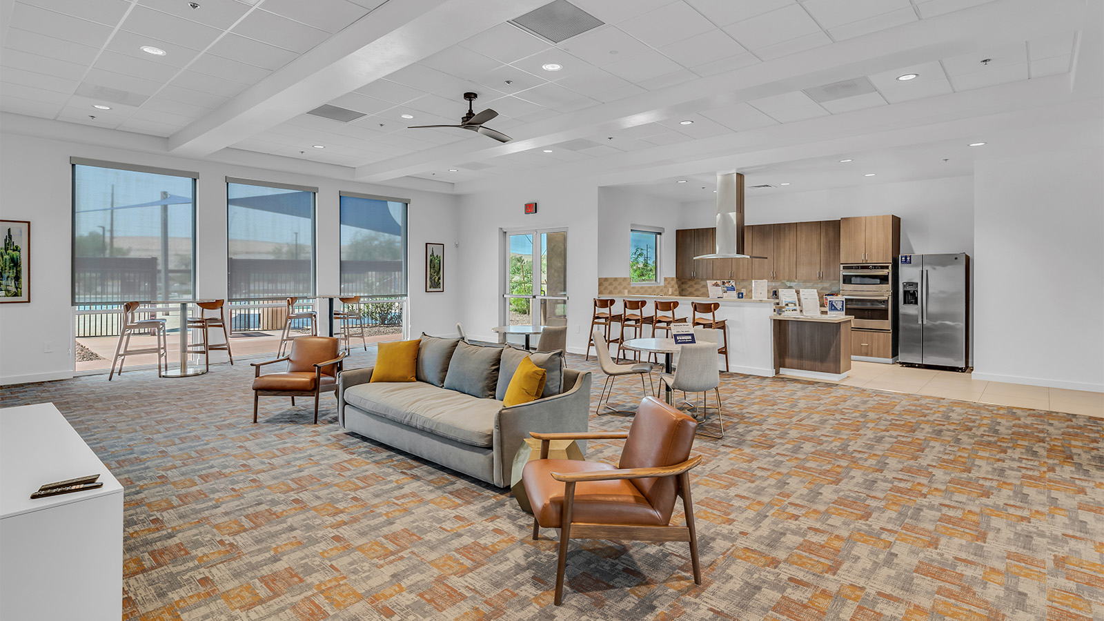 Welcome to The Aloe, a thoughtfully designed new floor plan within Coronet at Gladden Farms Community in Marana, Arizona. Offering 1,310 square feet of efficient and comfortable living space, The Aloe is ideal for those seeking a home that blends functionality, modern style, and everyday ease.  Upon entry, you’re welcomed into an open-concept layout that maximizes every square foot. The large great room serves as the heart of the home and flows seamlessly into the dining area and kitchen—perfect for both relaxing and entertaining. The kitchen is beautifully appointed with a central island, quartz countertops, Shaker-style cabinetry, and a dedicated pantry, creating a clean, modern aesthetic with ample storage and workspace.  The Aloe features three well-proportioned bedrooms designed for comfort and flexibility. The private primary suite is tucked away at the rear of the home and includes a walk-in closet and en-suite bathroom. Two additional bedrooms are located near the front of the home.  Designed with convenience in mind, the home includes a utility room near the kitchen, offering easy access to laundry and additional storage. A covered back patio extends the living space outdoors, providing the perfect setting to enjoy Gladden Farms beautiful weather and scenic surroundings.  Living at Coronet at Gladden Farms means enjoying a community that values both comfort and outdoor adventure. With access to 830 acres of green space, parks, playgrounds, and exclusive amenities like a sparkling pool, fitness center, and clubhouse, this community is perfect for families and active lifestyles.