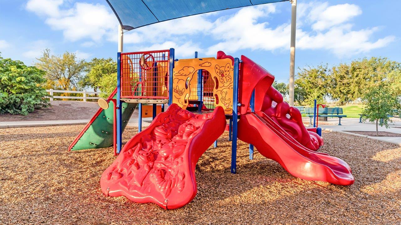 Welcome to The Aloe, a thoughtfully designed new floor plan within Coronet at Gladden Farms Community in Marana, Arizona. Offering 1,310 square feet of efficient and comfortable living space, The Aloe is ideal for those seeking a home that blends functionality, modern style, and everyday ease.  Upon entry, you’re welcomed into an open-concept layout that maximizes every square foot. The large great room serves as the heart of the home and flows seamlessly into the dining area and kitchen—perfect for both relaxing and entertaining. The kitchen is beautifully appointed with a central island, quartz countertops, Shaker-style cabinetry, and a dedicated pantry, creating a clean, modern aesthetic with ample storage and workspace.  The Aloe features three well-proportioned bedrooms designed for comfort and flexibility. The private primary suite is tucked away at the rear of the home and includes a walk-in closet and en-suite bathroom. Two additional bedrooms are located near the front of the home.  Designed with convenience in mind, the home includes a utility room near the kitchen, offering easy access to laundry and additional storage. A covered back patio extends the living space outdoors, providing the perfect setting to enjoy Gladden Farms beautiful weather and scenic surroundings.  Living at Coronet at Gladden Farms means enjoying a community that values both comfort and outdoor adventure. With access to 830 acres of green space, parks, playgrounds, and exclusive amenities like a sparkling pool, fitness center, and clubhouse, this community is perfect for families and active lifestyles.