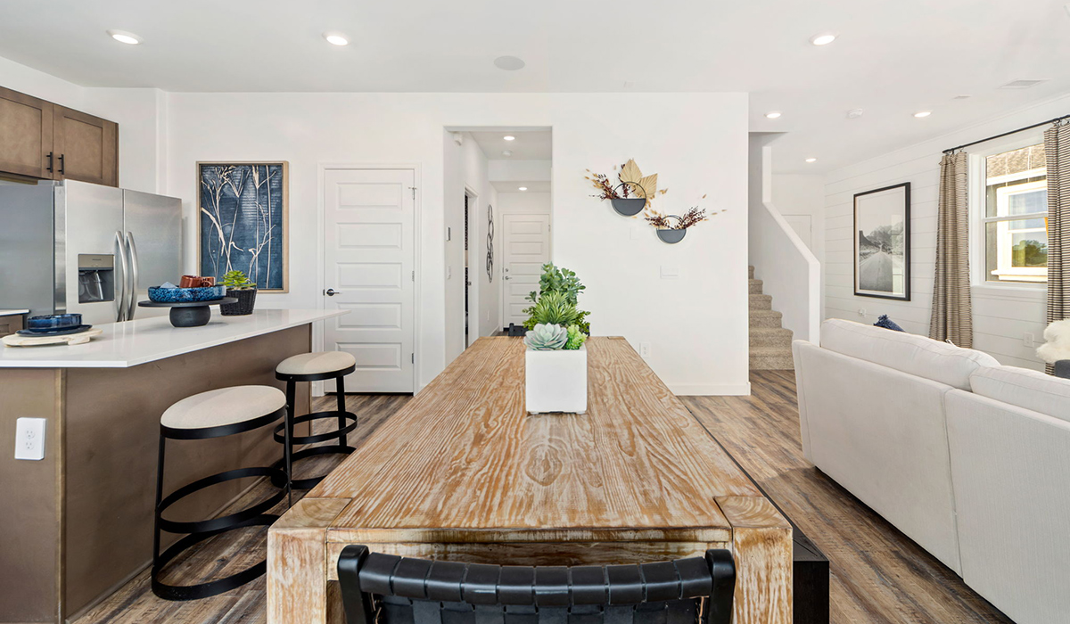 Discover the Gila, a brand new versatile two-story floor plan offering 2,057 sq. ft. of comfortable, modern living space available now within Coronet at Gladden Farms Community in Marana, Arizona.  Thoughtfully crafted for households of all sizes, the Gila features four bedrooms, a spacious loft, and three full bathrooms, ensuring every family member has their own space to unwind and recharge.  A standout highlight of this home is the guest-style suite on the main floor, offering convenient access to a full bathroom. Perfect for visitors, multi-generational living, or private home office, this main-level bedroom offers exceptional flexibility.  The main floor creates an inviting flow, with a generous great room that connects seamlessly to the dining area and kitchen. The kitchen features a large center island, Shaker-style cabinetry, and ample storage space to include a large pantry.  Upstairs, the Gila continues to impress with thoughtful design and family-friendly layout. The well-appointed primary bedroom includes a private en-suite bathroom and large walk-in closet. Bedrooms 2 and 3, along with the loft, share a full bathroom conveniently located for easy access. An additional standout feature is Bedroom 2, which includes a large walk-in closet—a perfect setup for teens, young adults, or anyone who appreciates extra storage and personal space. The second floor also features a large laundry room, conveniently located near the bedrooms.  The Gila is designed with energy efficiency in mind. This DOE Zero Energy Ready Home offers a sustainable lifestyle with advanced features like tankless water heaters, energy-efficient LED lighting, and high-performance insulation, ensuring lower utility costs and a reduced environmental footprint.  Living at Coronet at Gladden Farms means enjoying a community that values both comfort and outdoor adventure. With access to 830 acres of green space, parks, playgrounds, and exclusive amenities like a sparkling pool, fitness center, and clubhouse, this community is perfect for families and active lifestyles.  *Images shown are for reference only. They depict the Gila model home and may not represent the actual home.